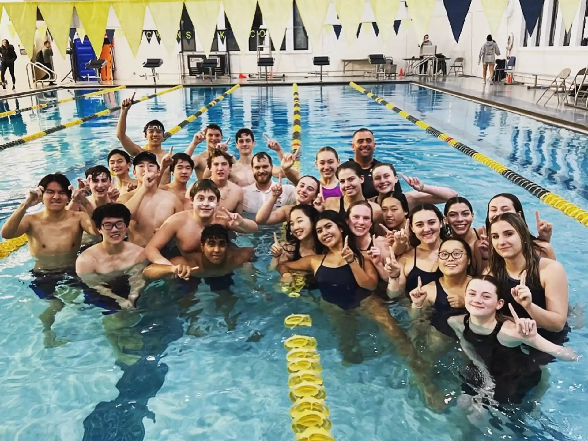 a group of people in a pool