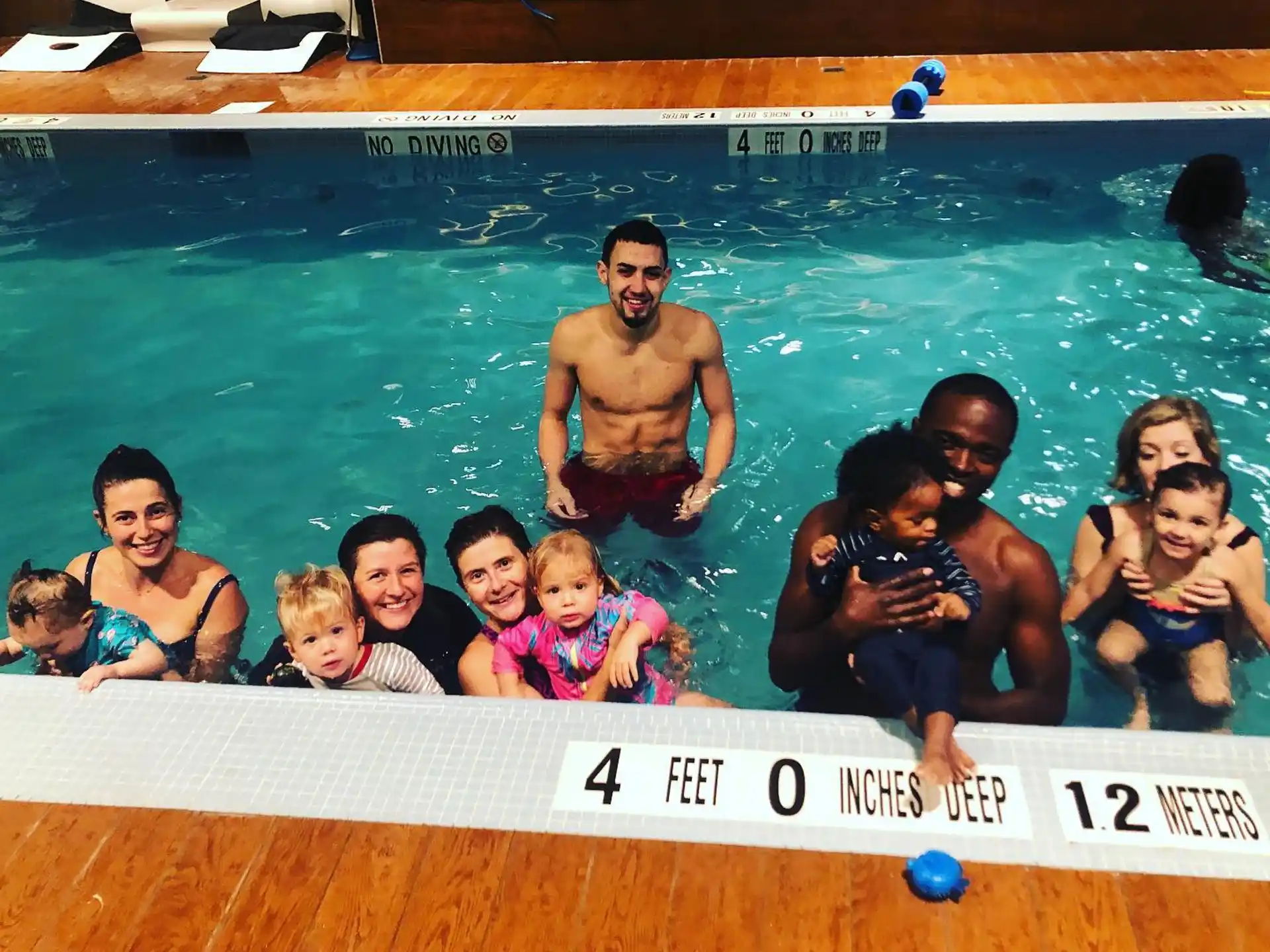 a group of people in a pool