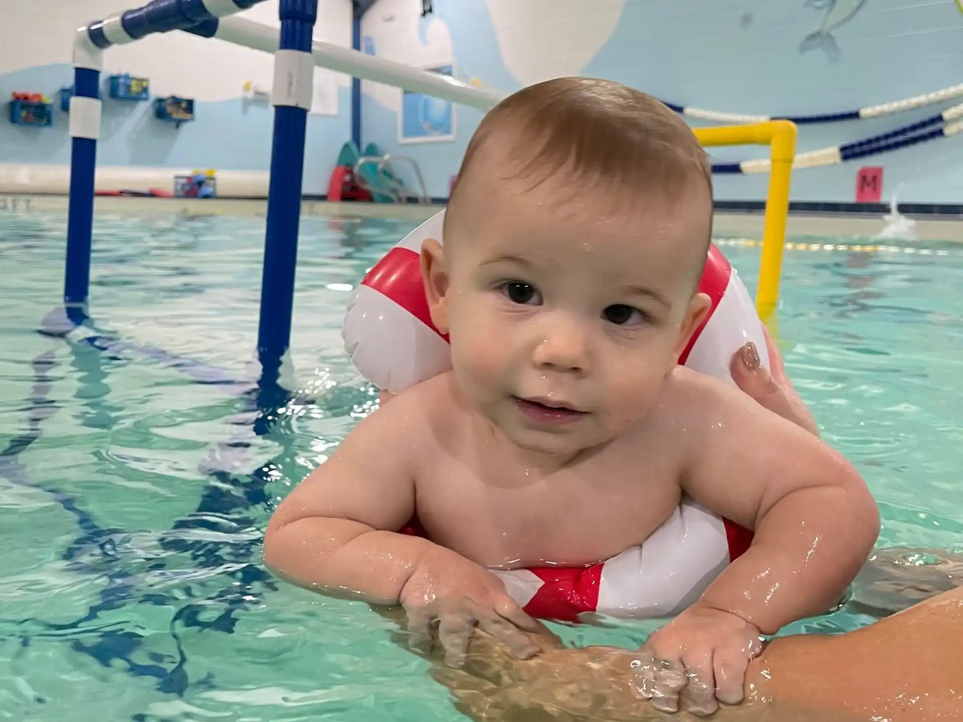 a baby in a pool
