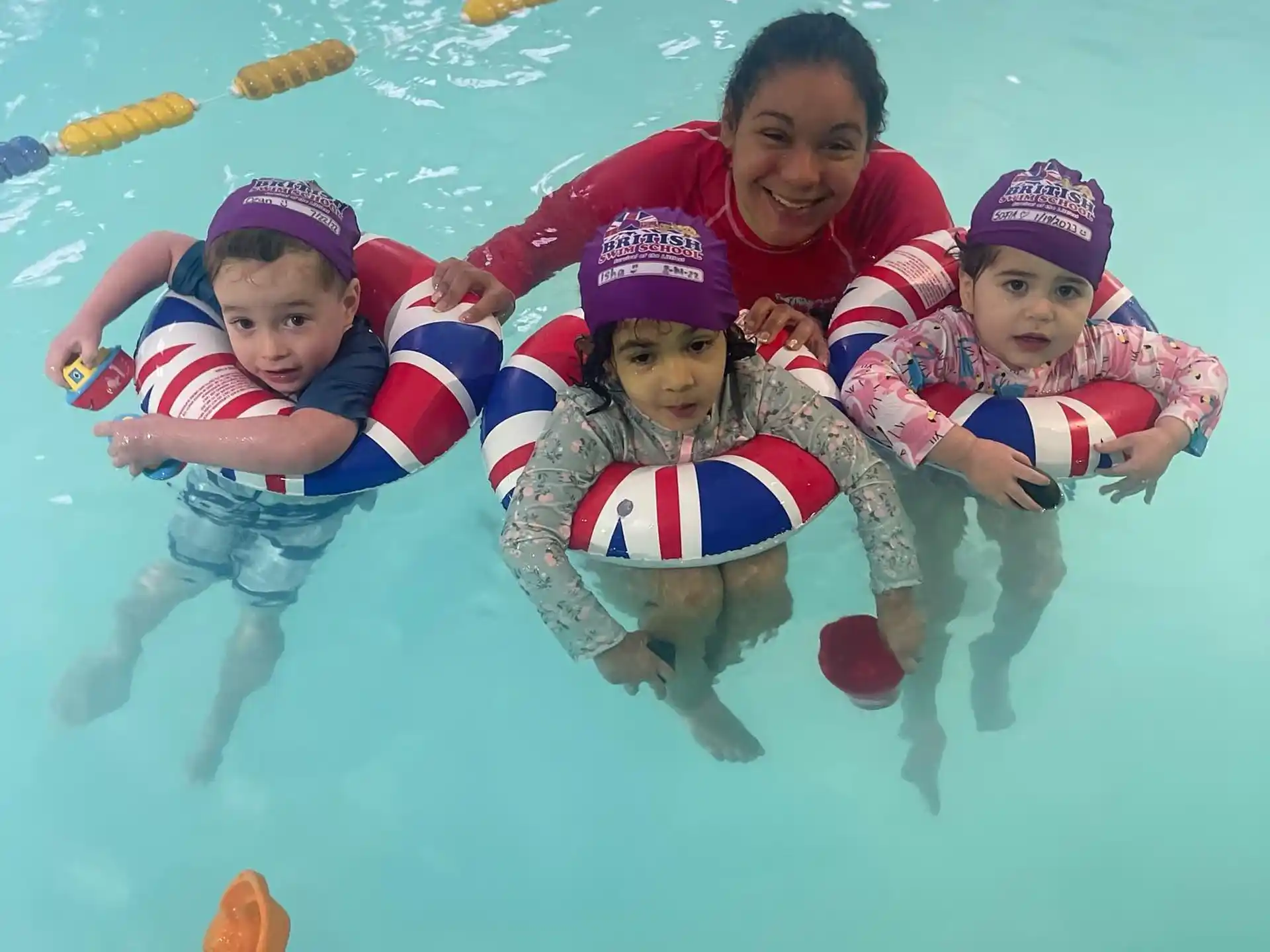 a group of people in a pool