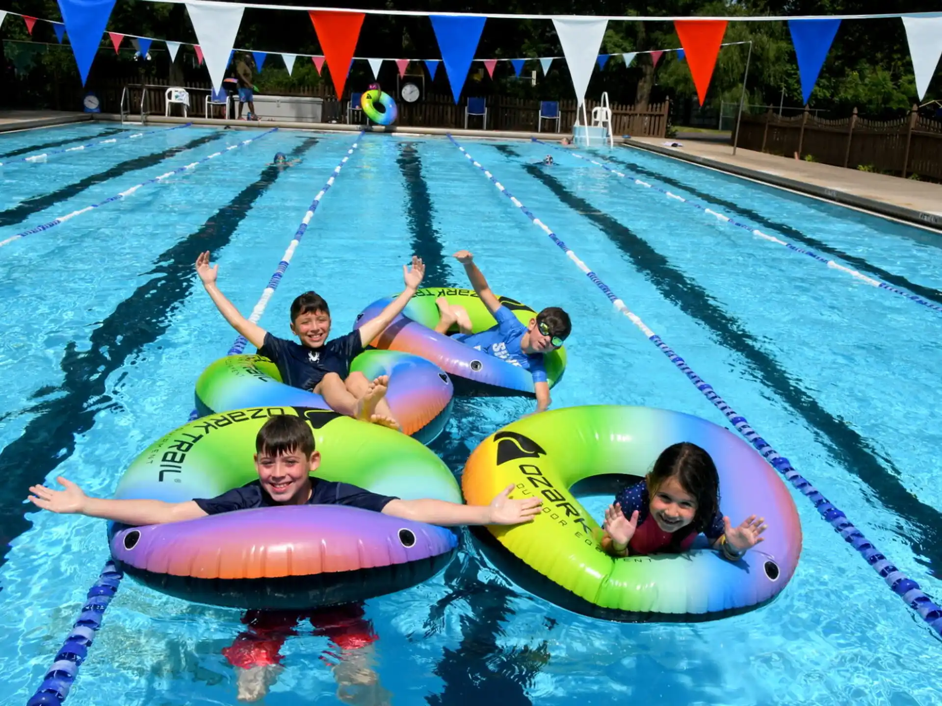 a group of people in a pool