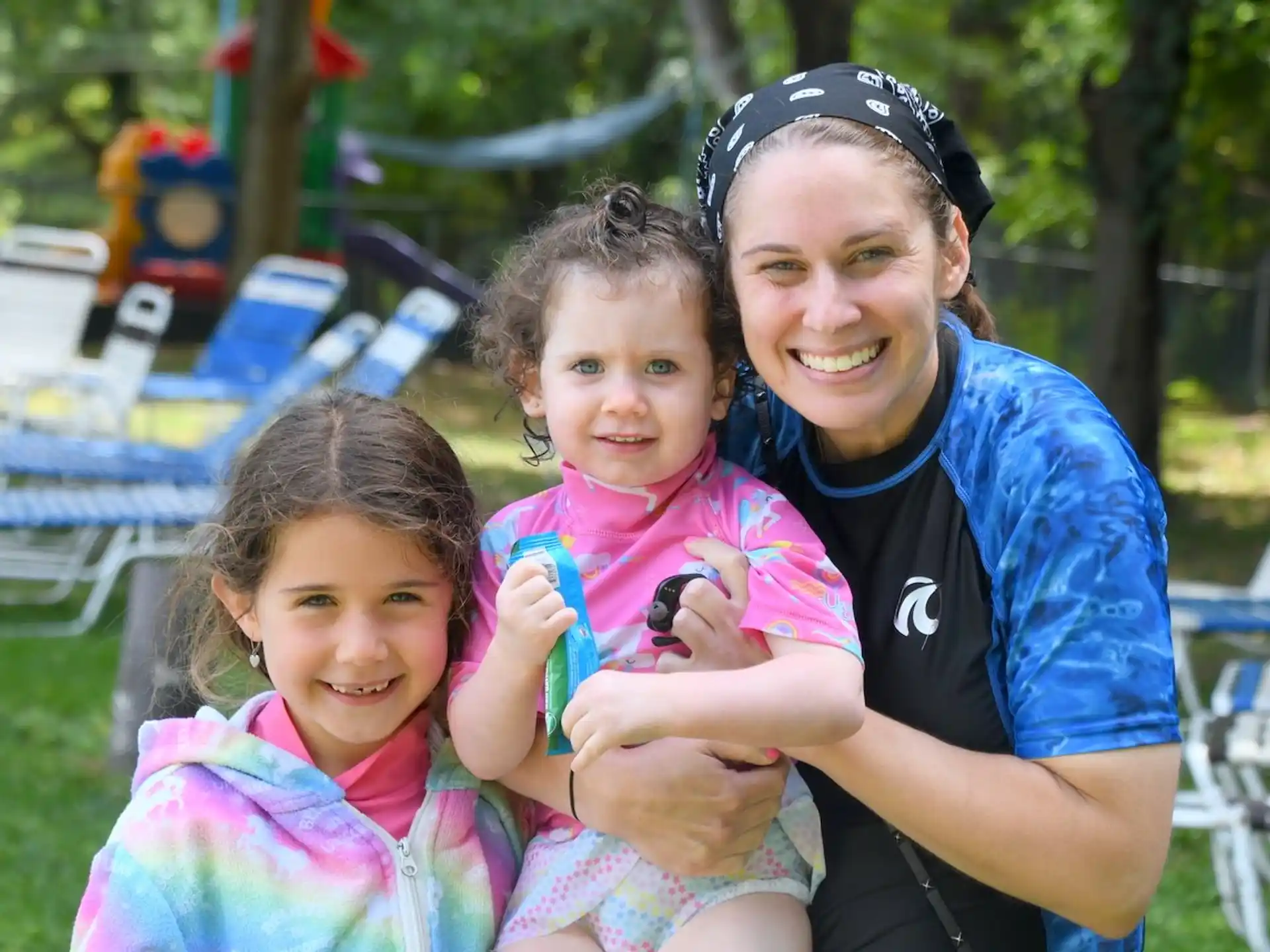 a person and two girls