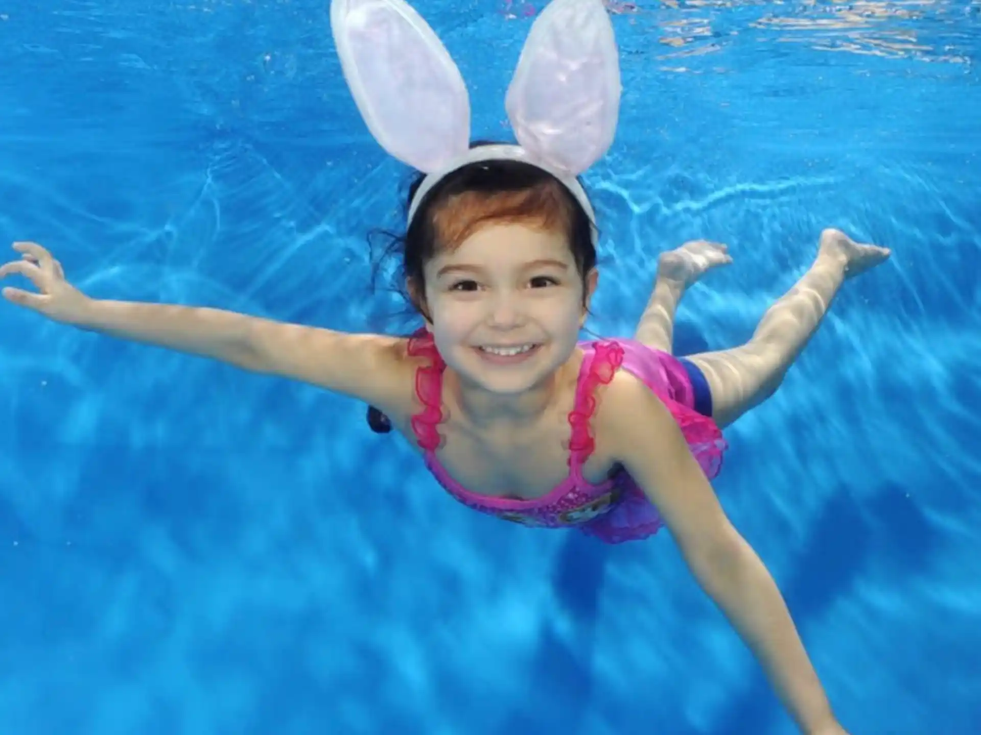 a girl in a pool