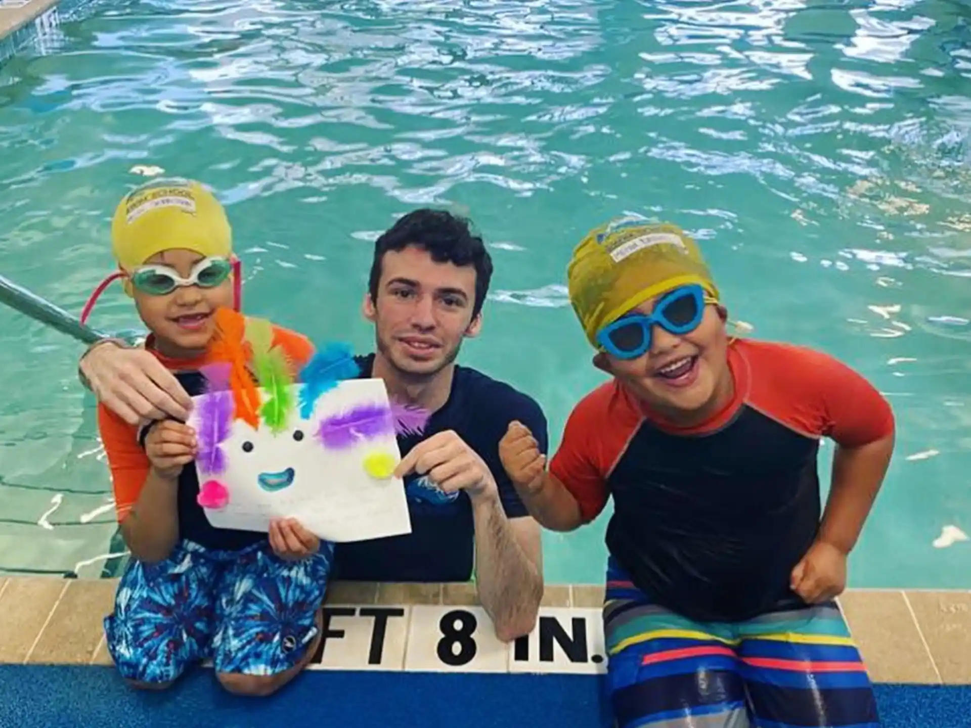 a group of people in a pool