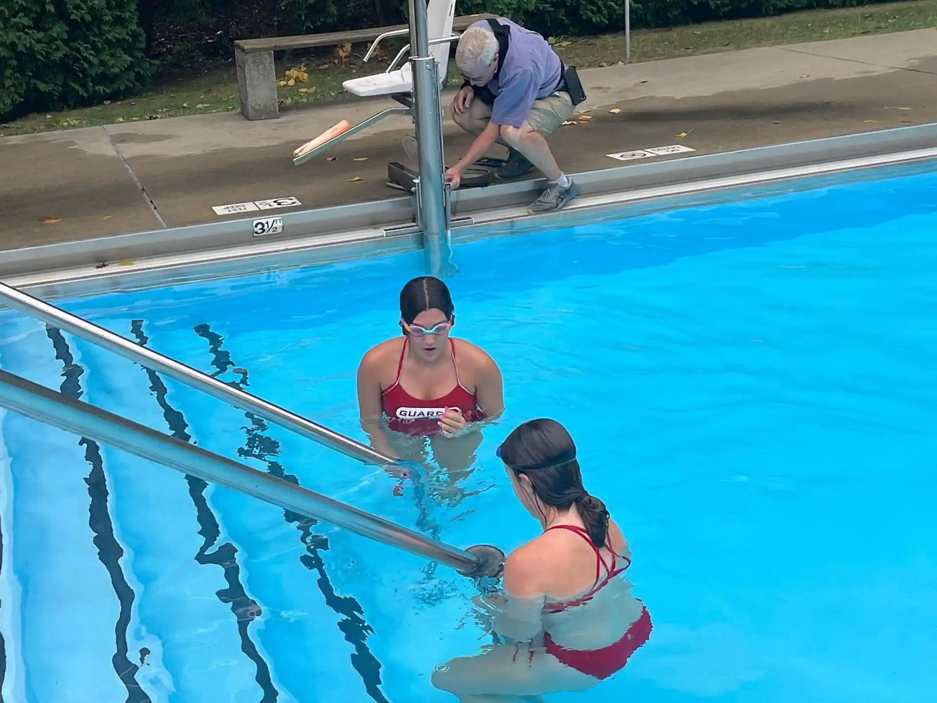 a group of people in a pool