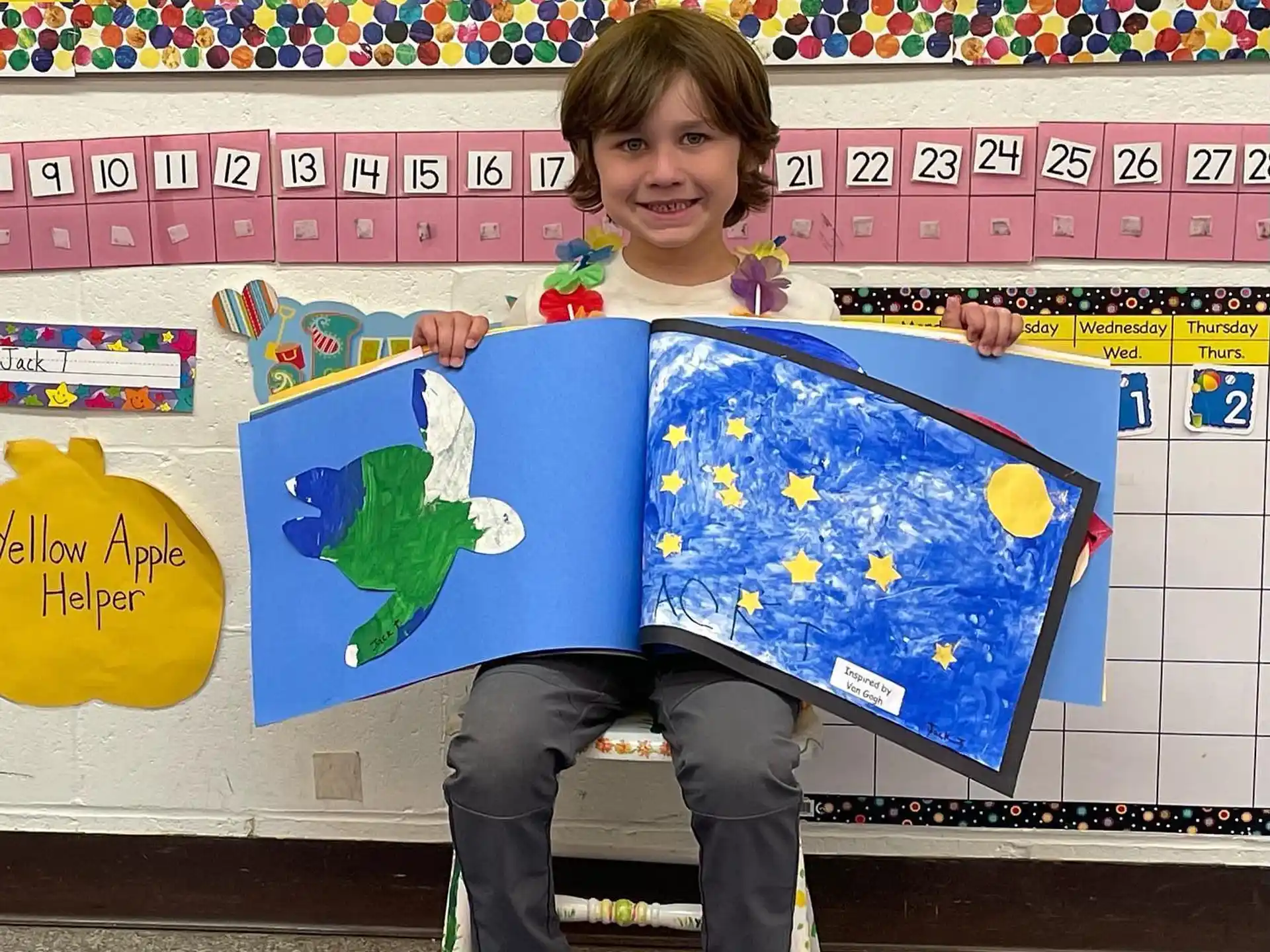 a boy holding a flag