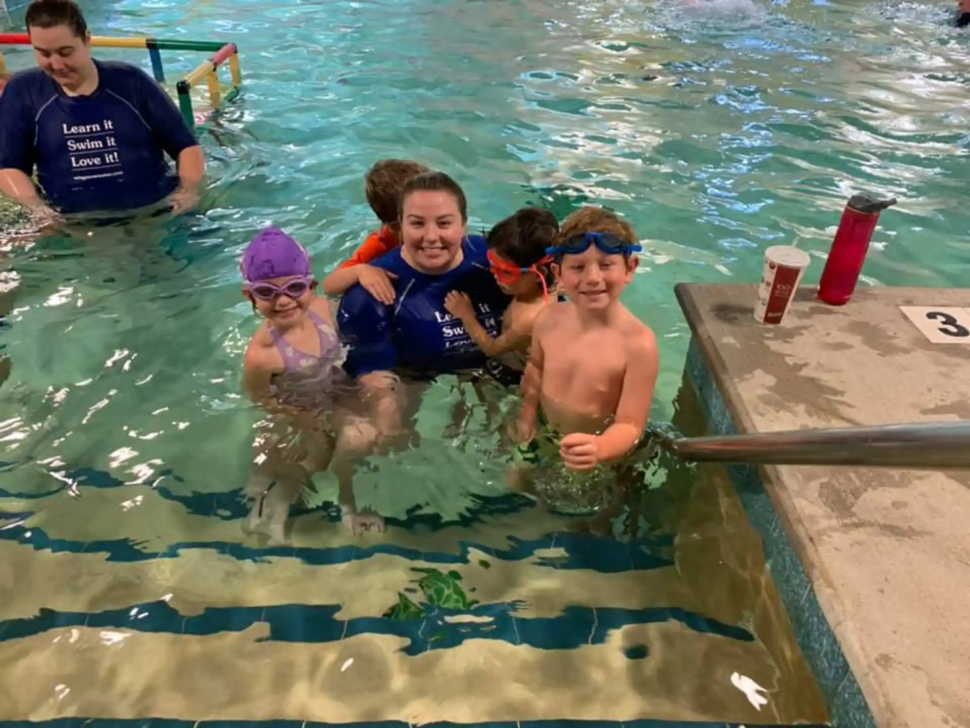 a group of people in a pool