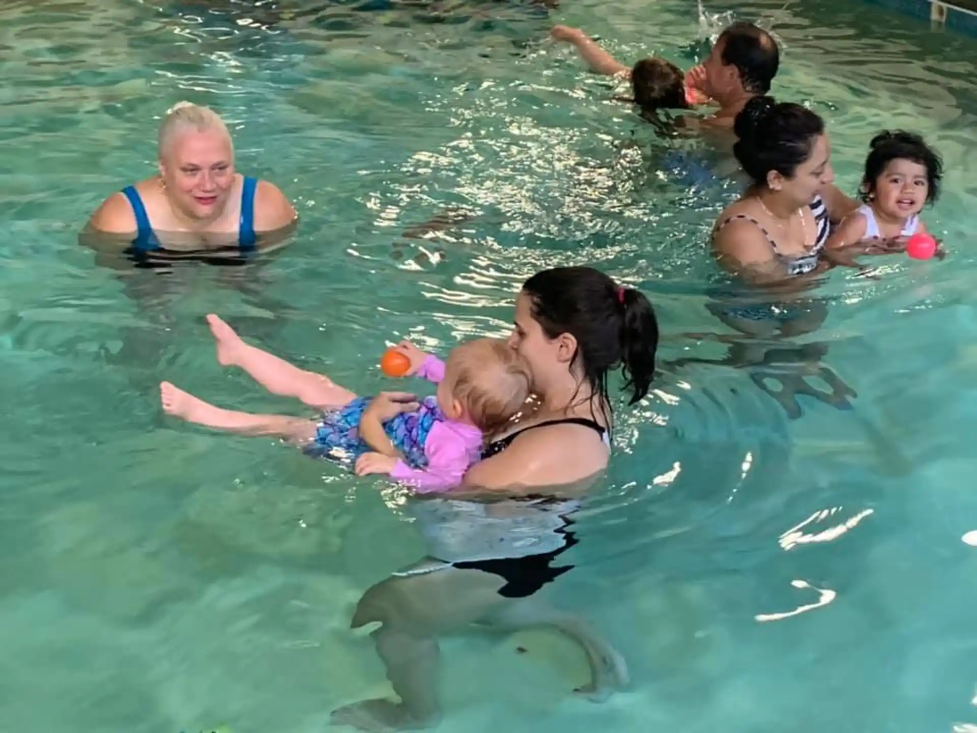 a group of people in the water