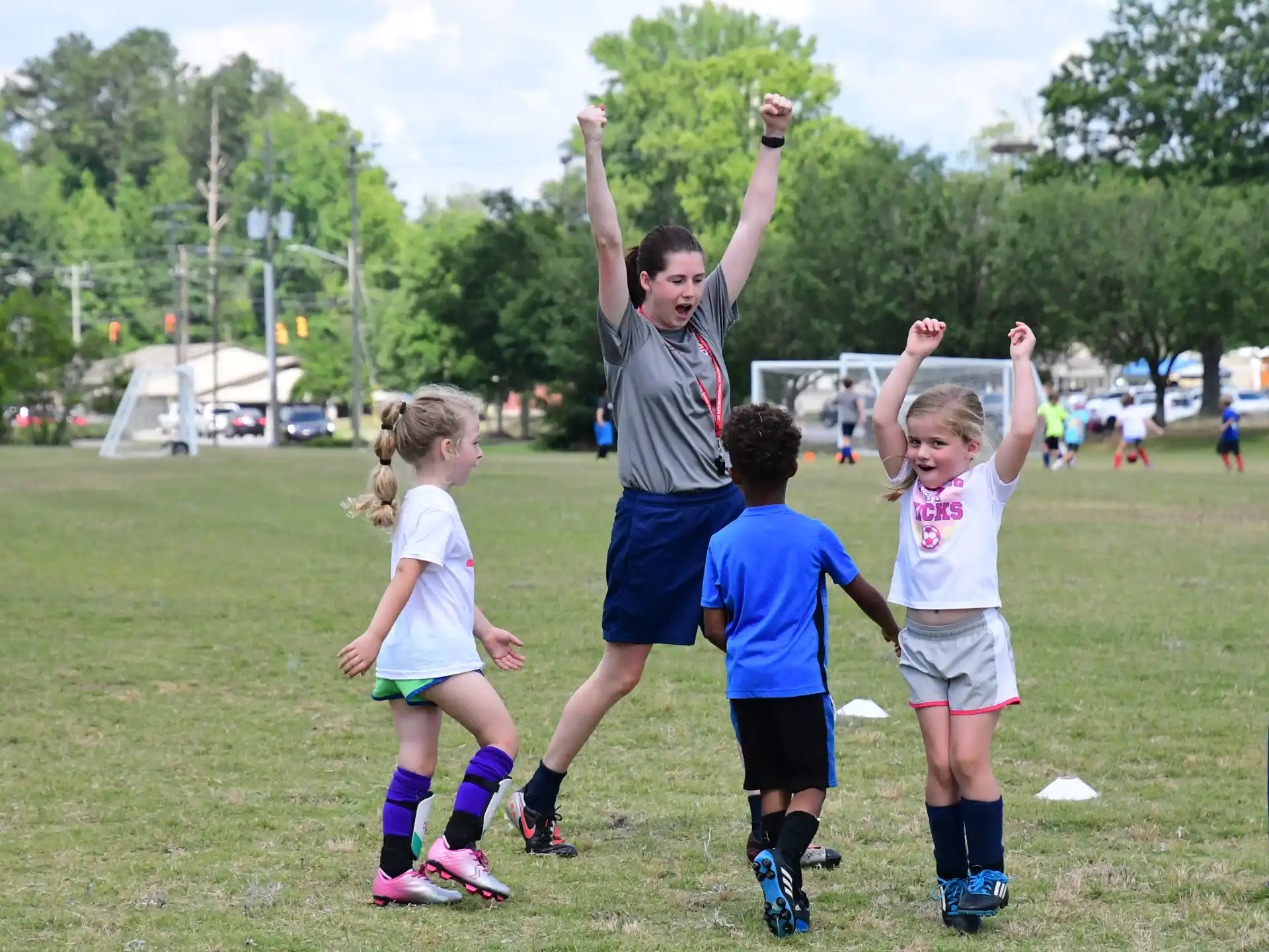 a group of kids playing football