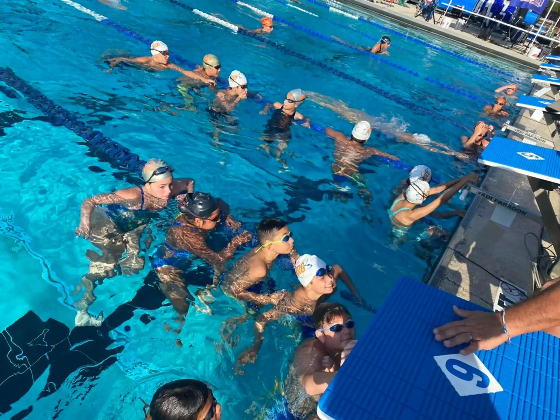 a group of people in a pool