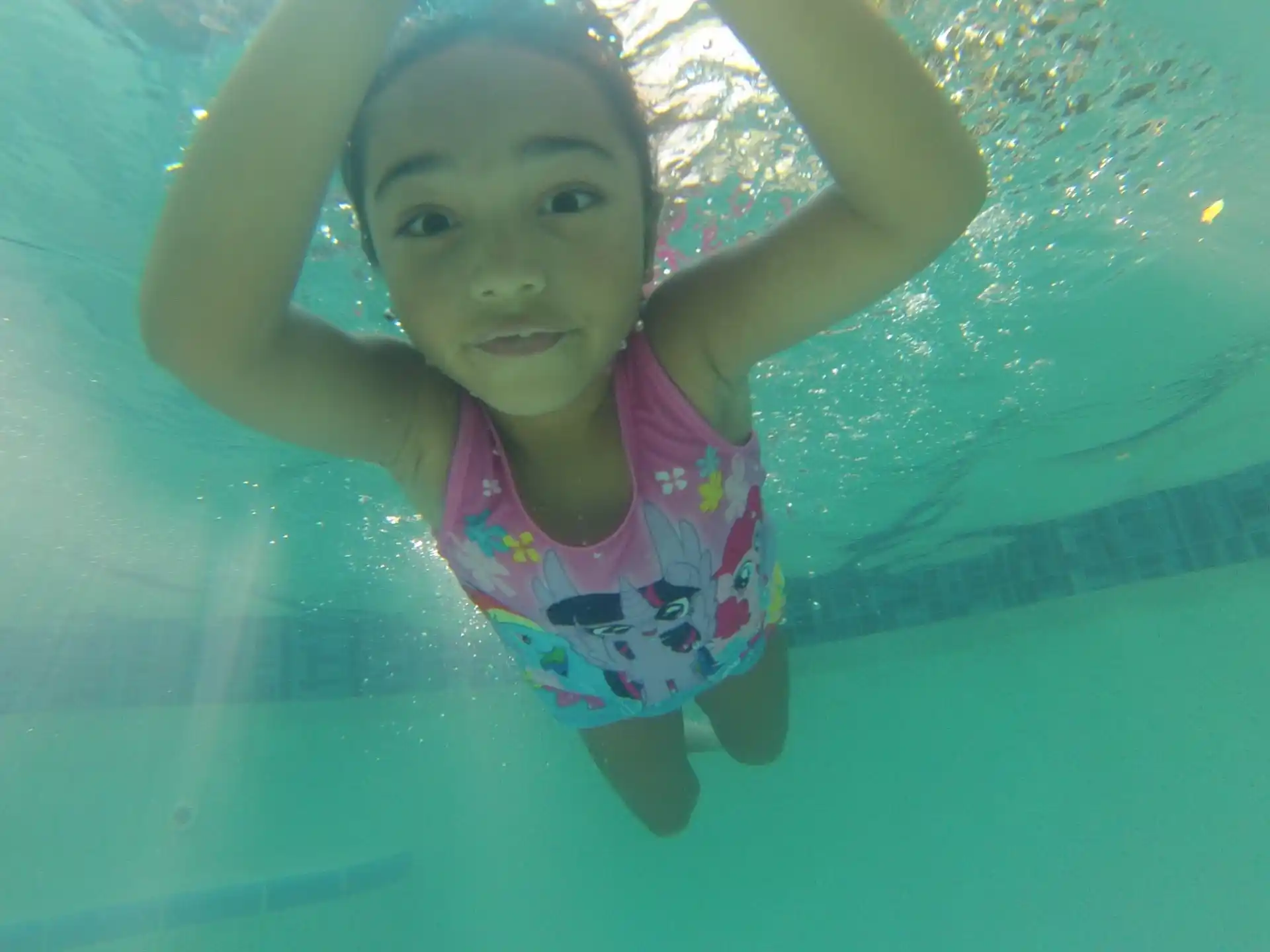 a girl in a pool