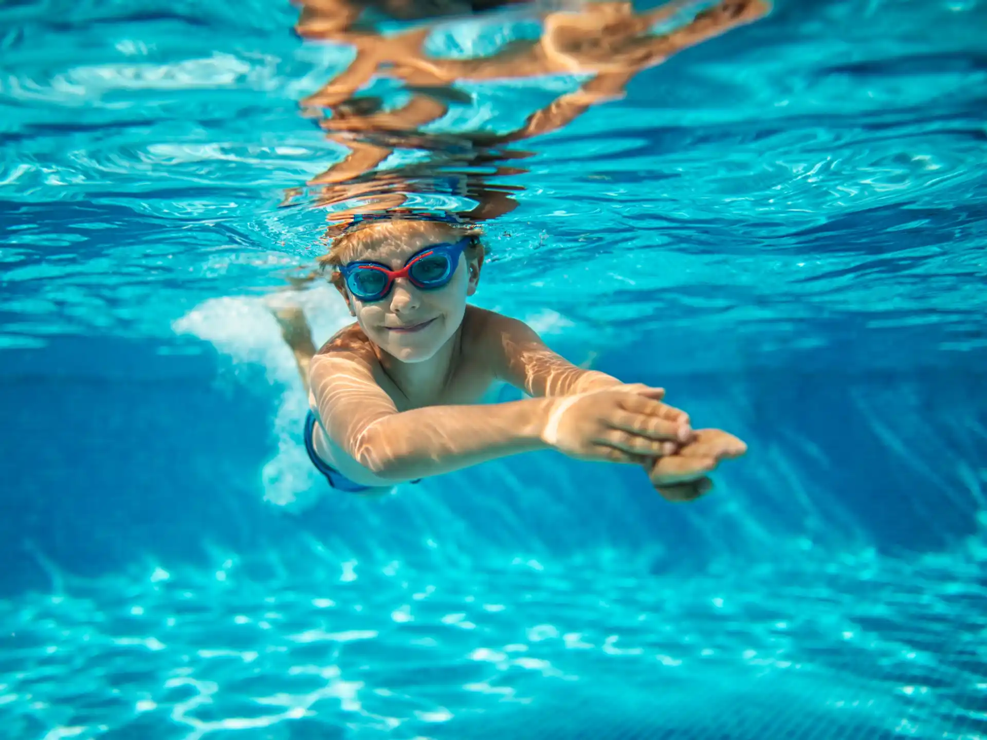 a person swimming in a pool
