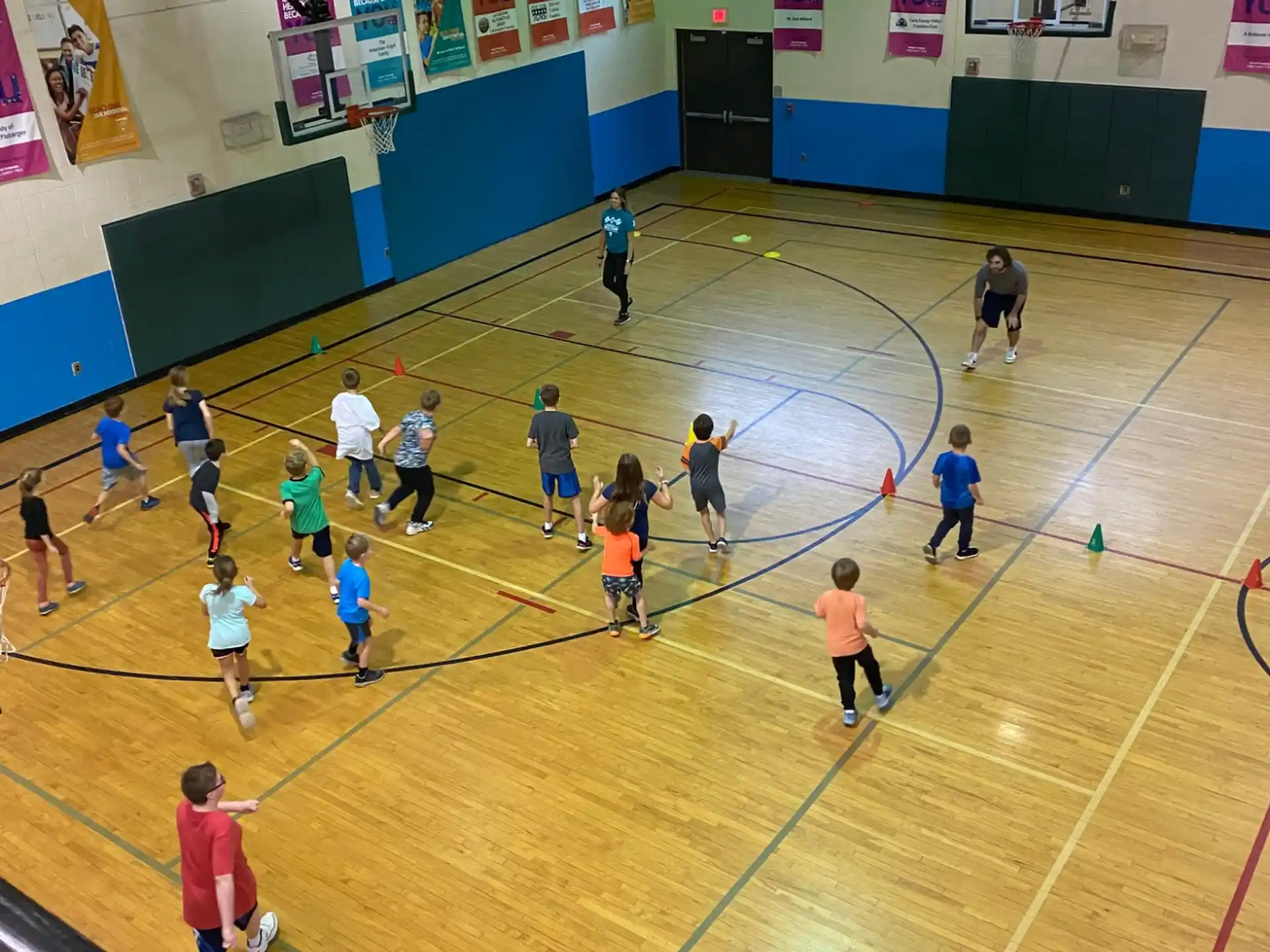 a group of people playing volleyball
