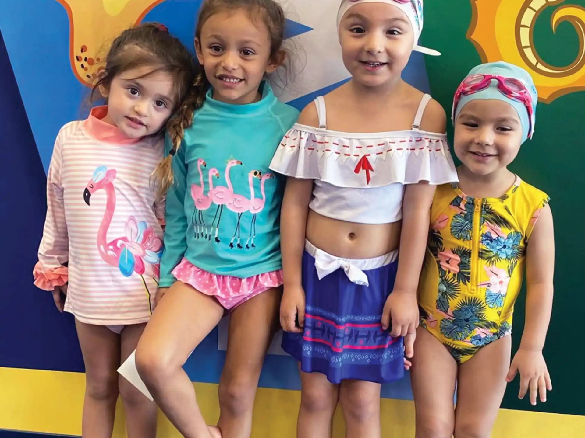 a group of girls posing for a photo