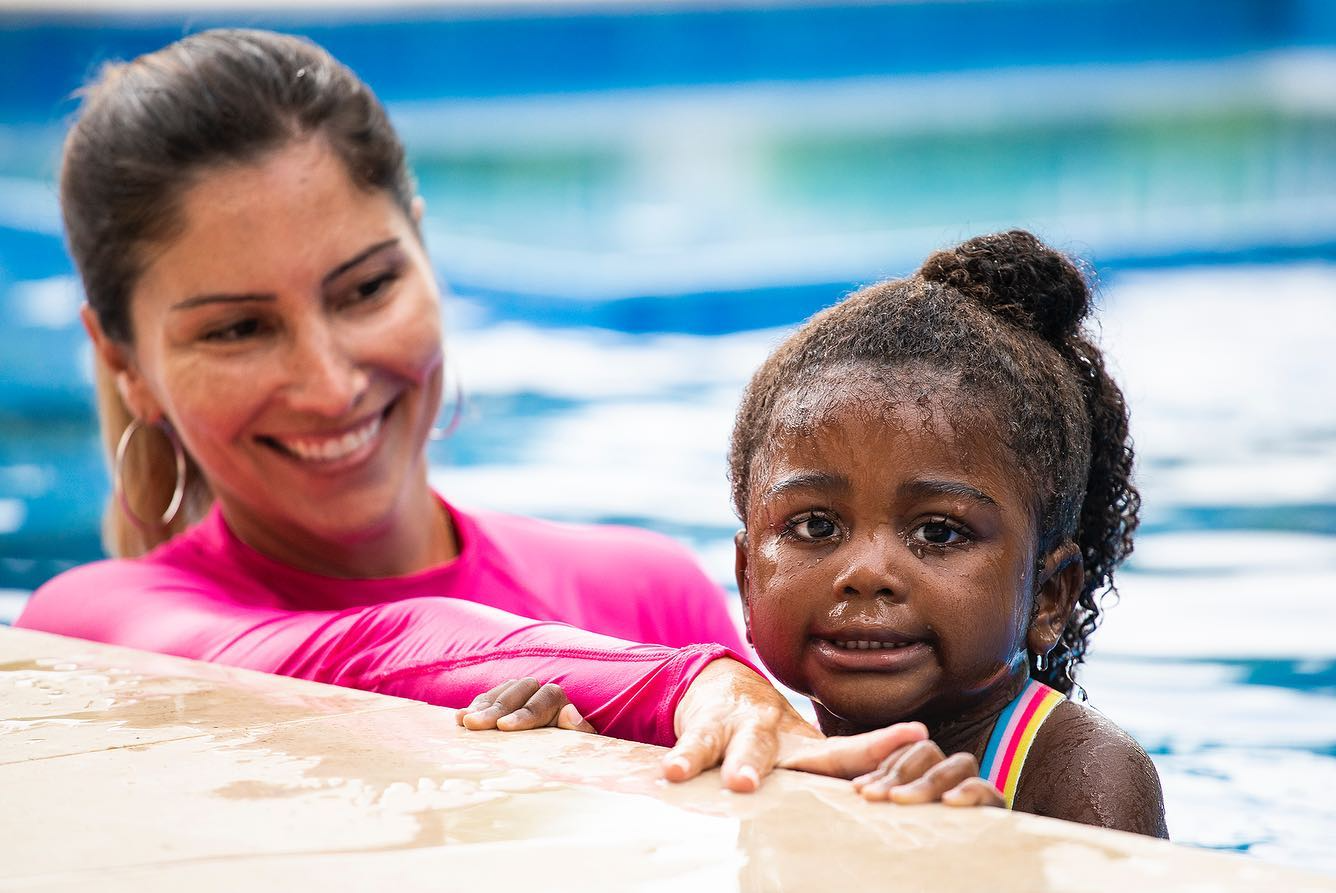a person and a child in the water