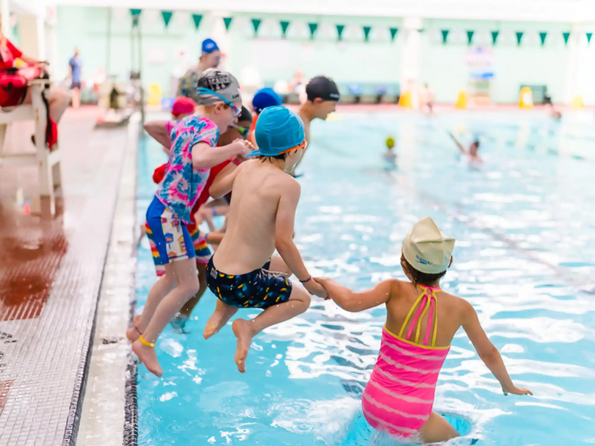 a group of people in a pool