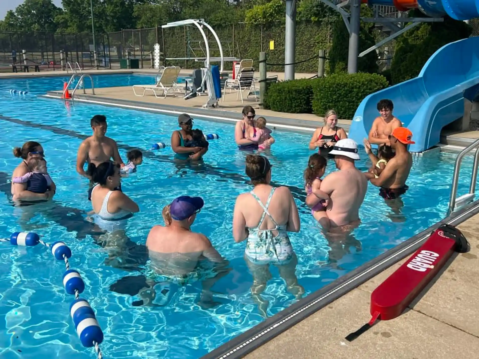 a group of people in a pool