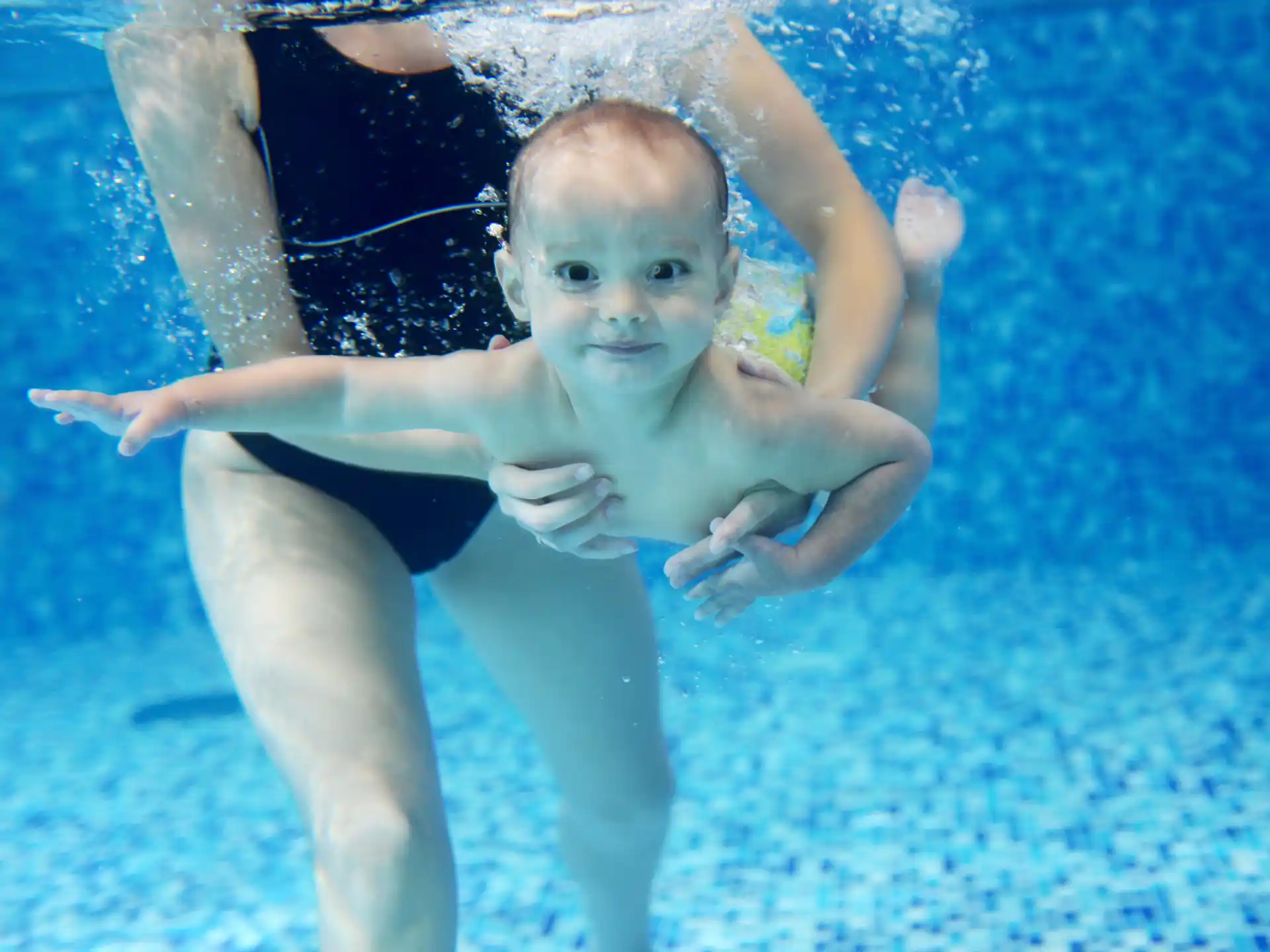 a baby in a pool
