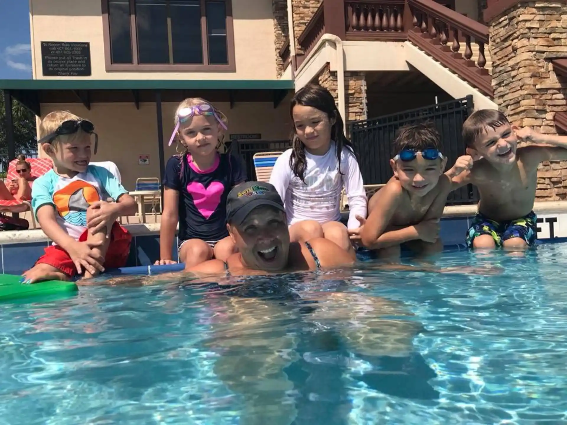 a group of people in a pool