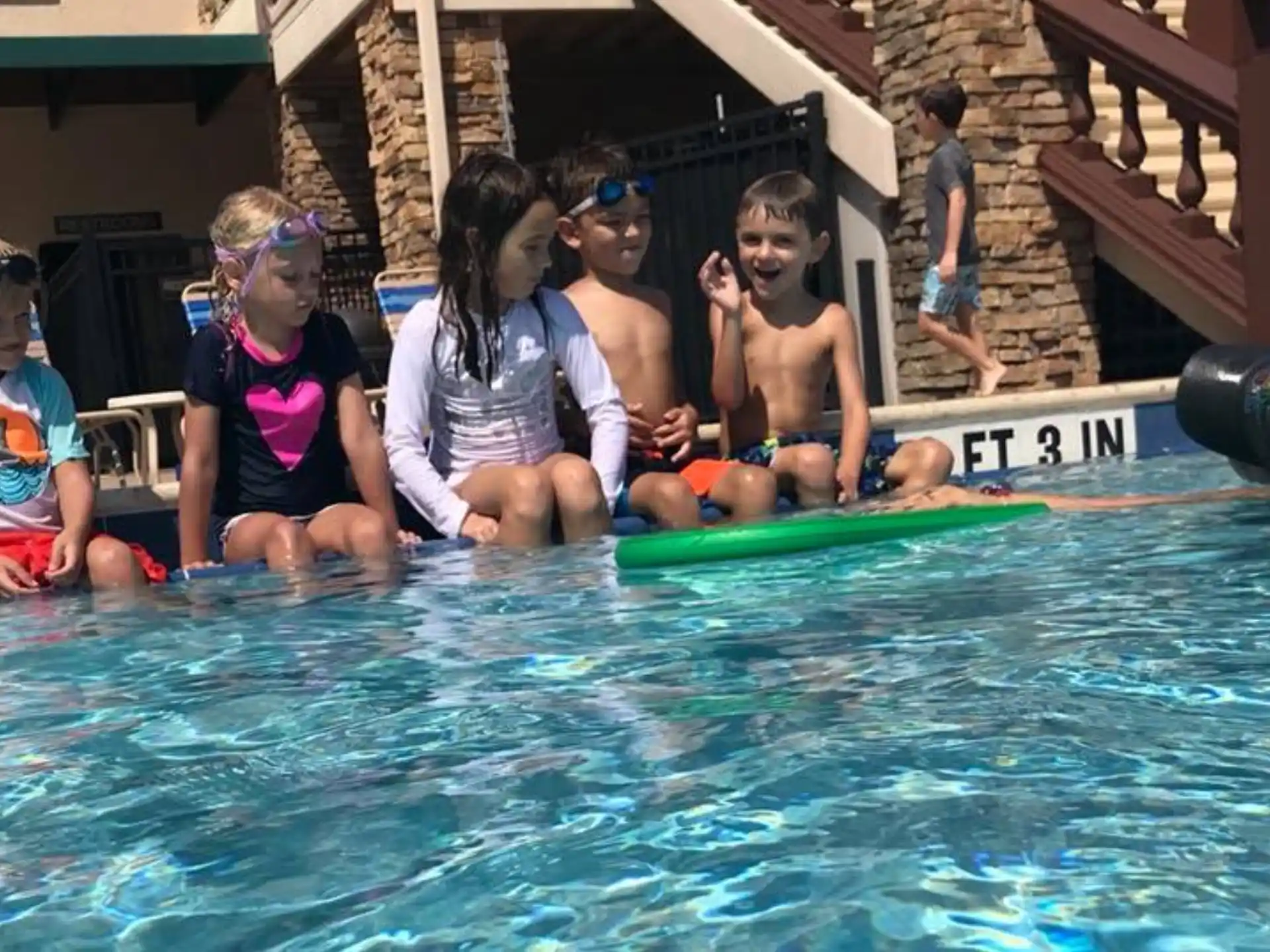 a group of people in a pool