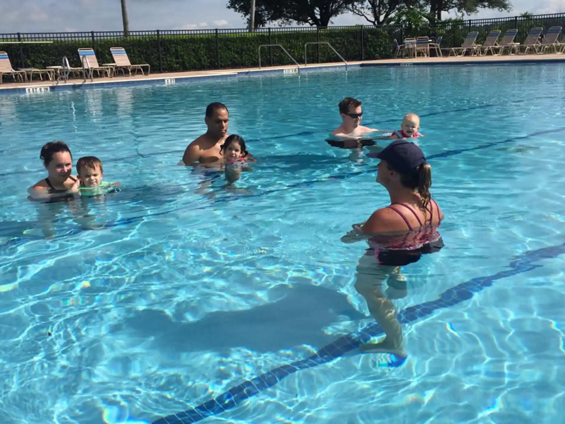 a group of people in a pool