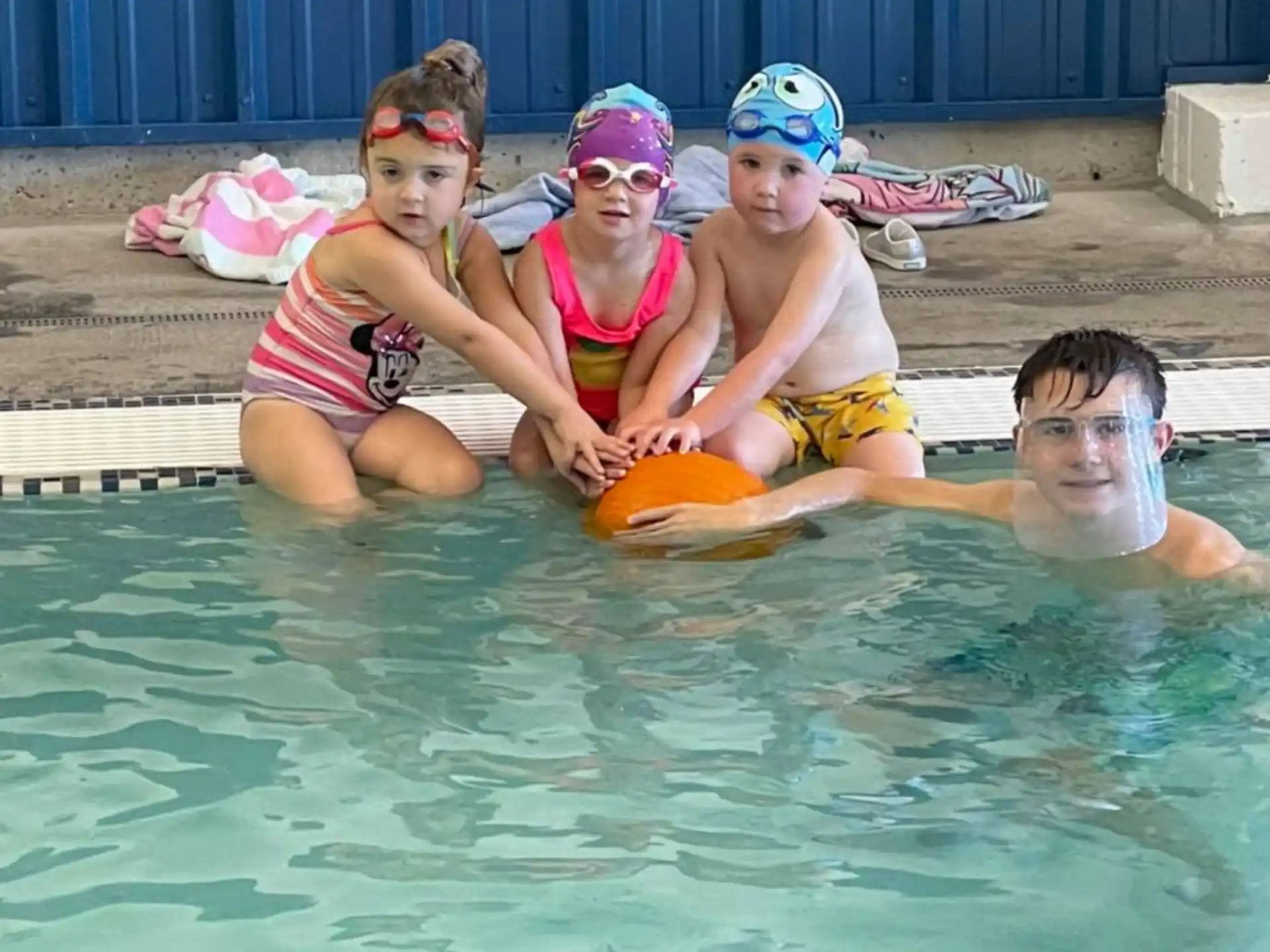 a group of people in a pool