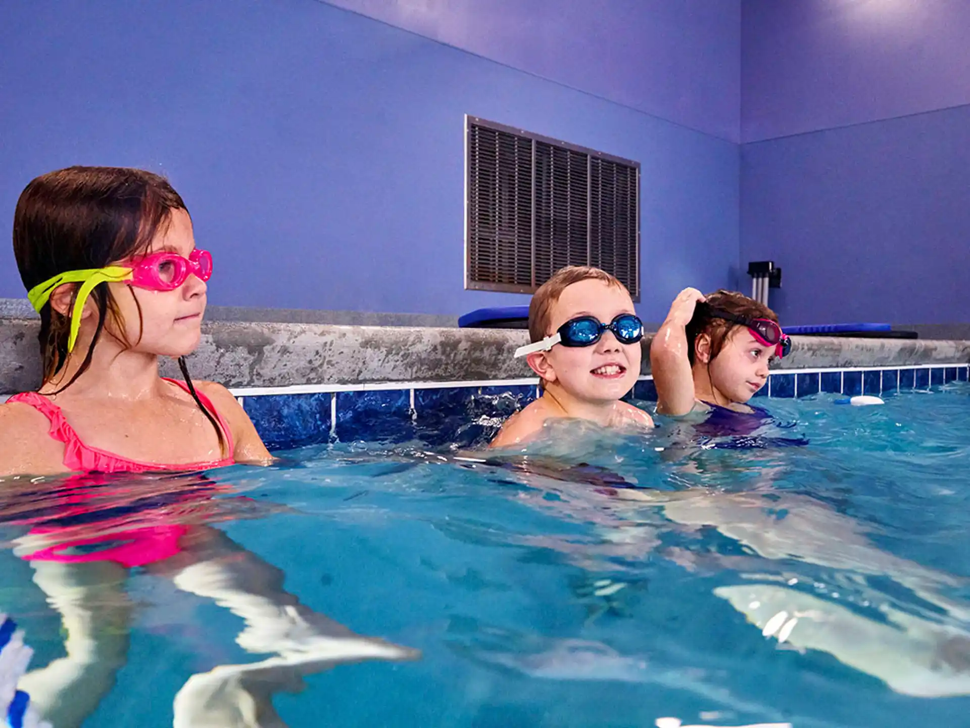 a group of people in a pool
