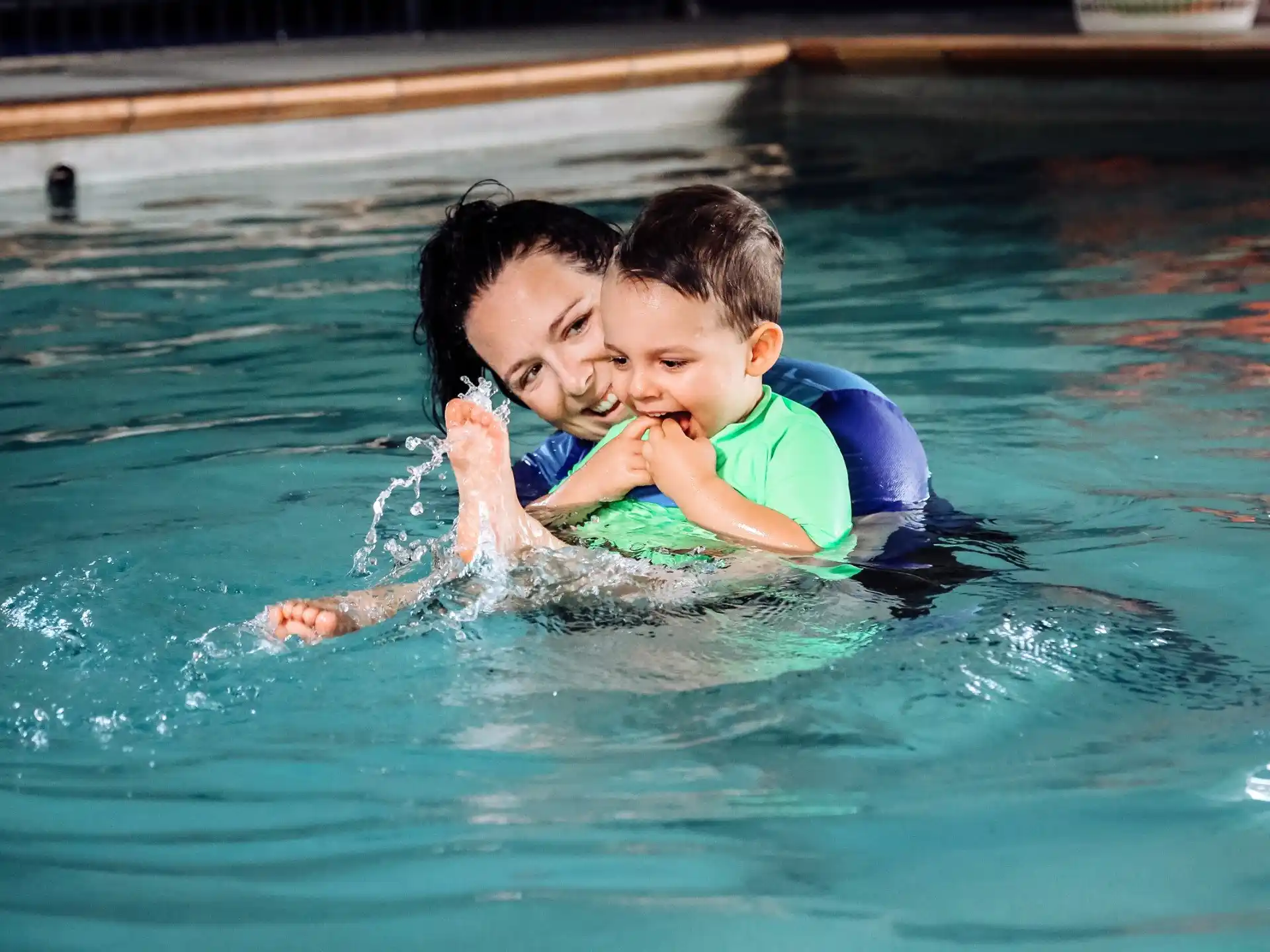 a boy and a girl in the water
