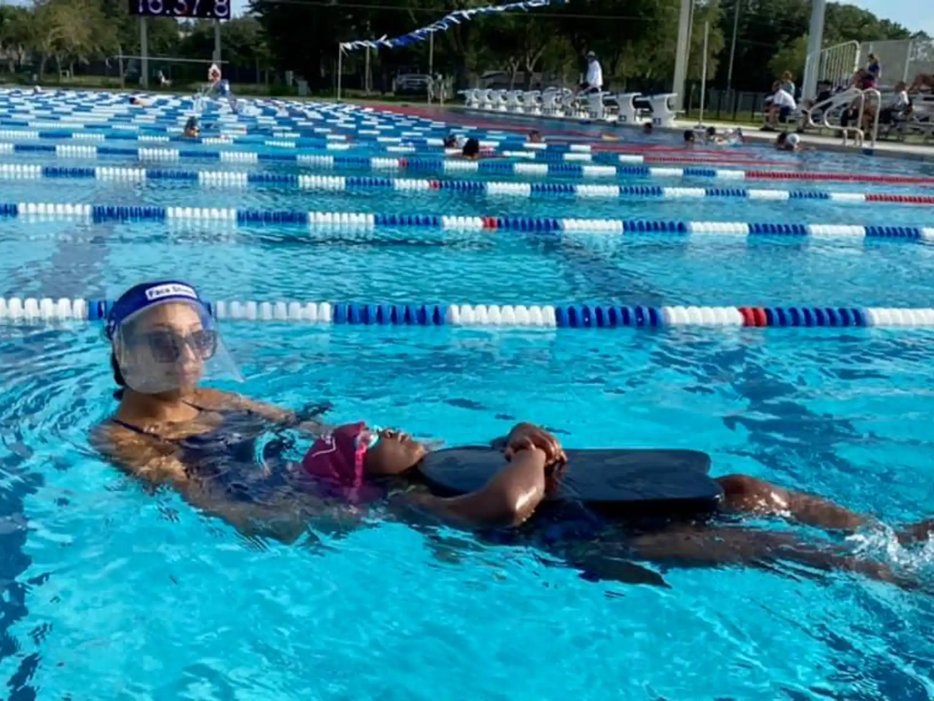 a couple of women in a pool