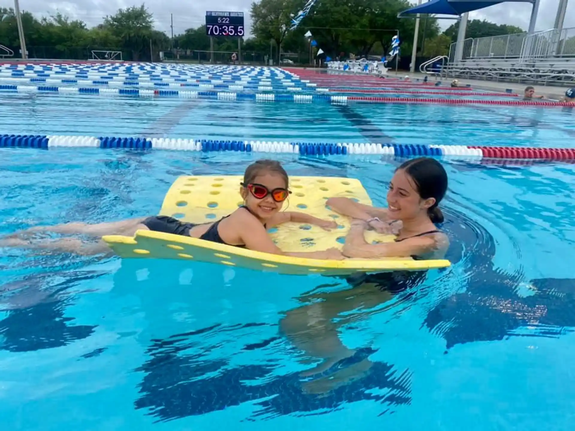 a man and woman in a pool