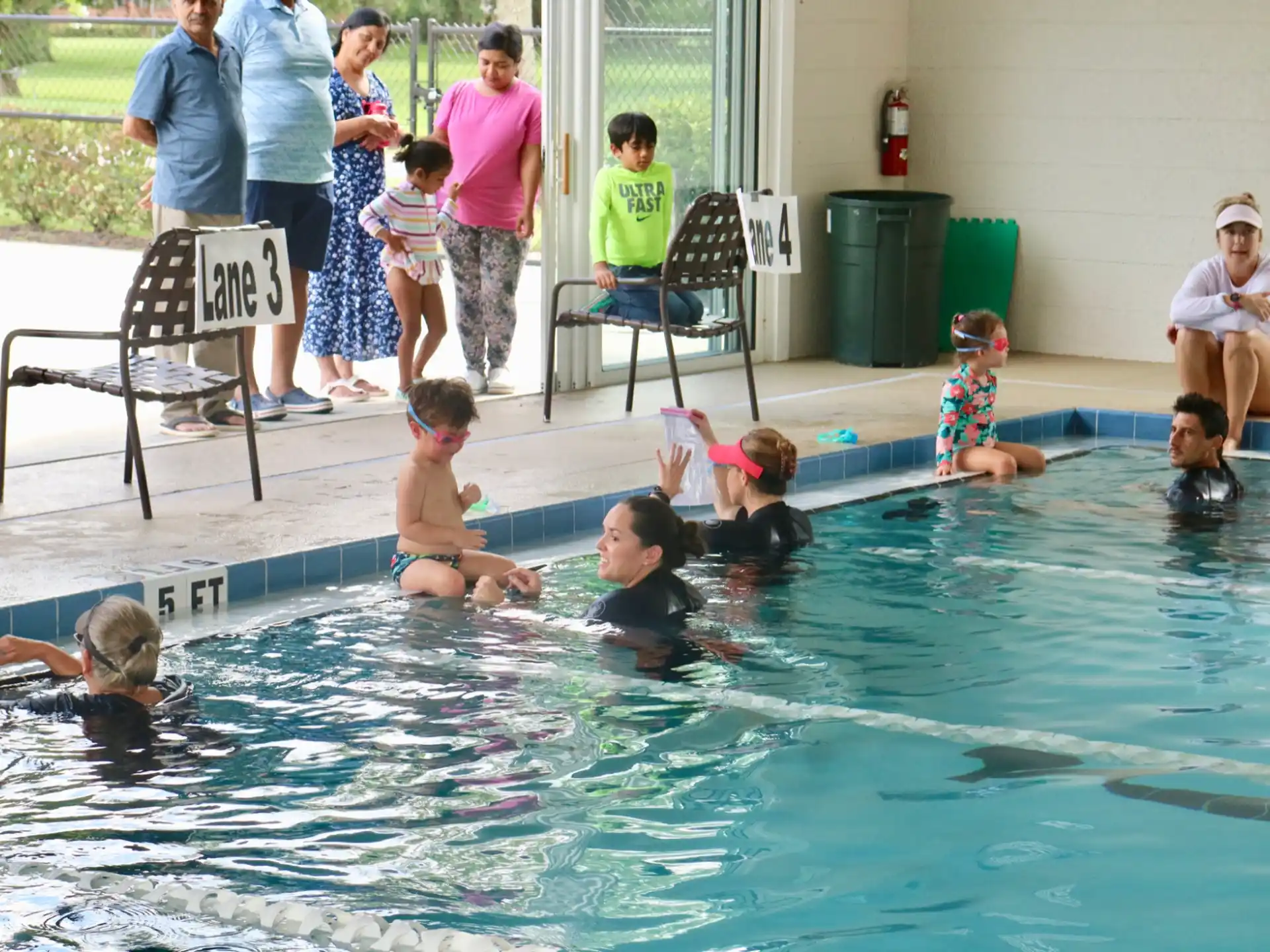 a group of people in a pool