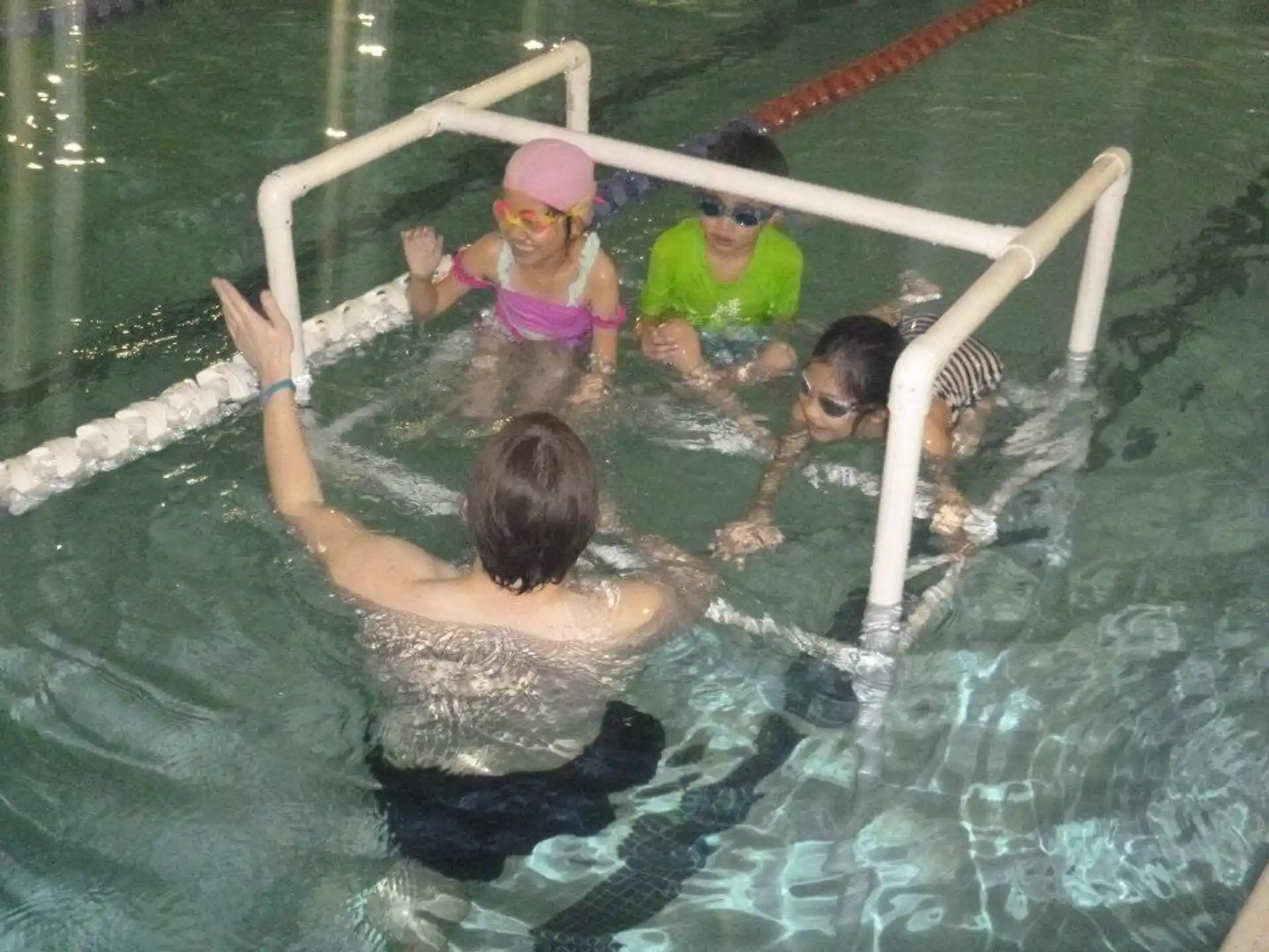 a group of people in a pool