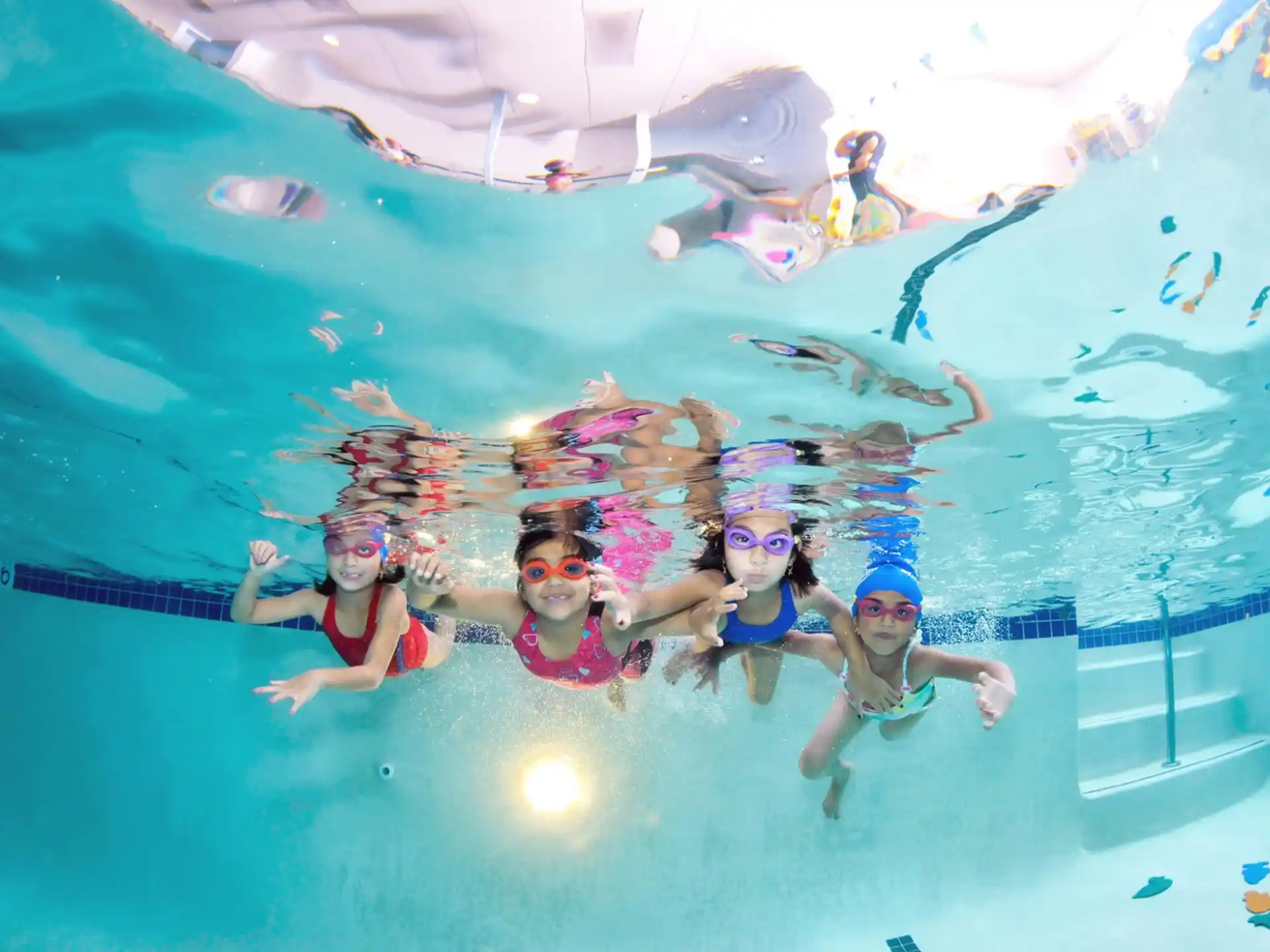 a group of people in a pool