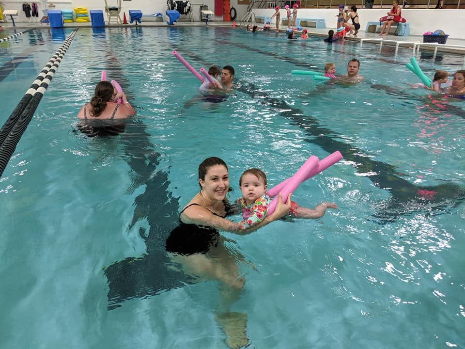 a group of people in a pool