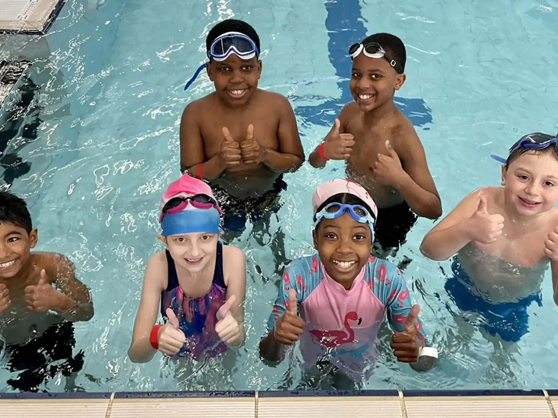a group of people in a pool