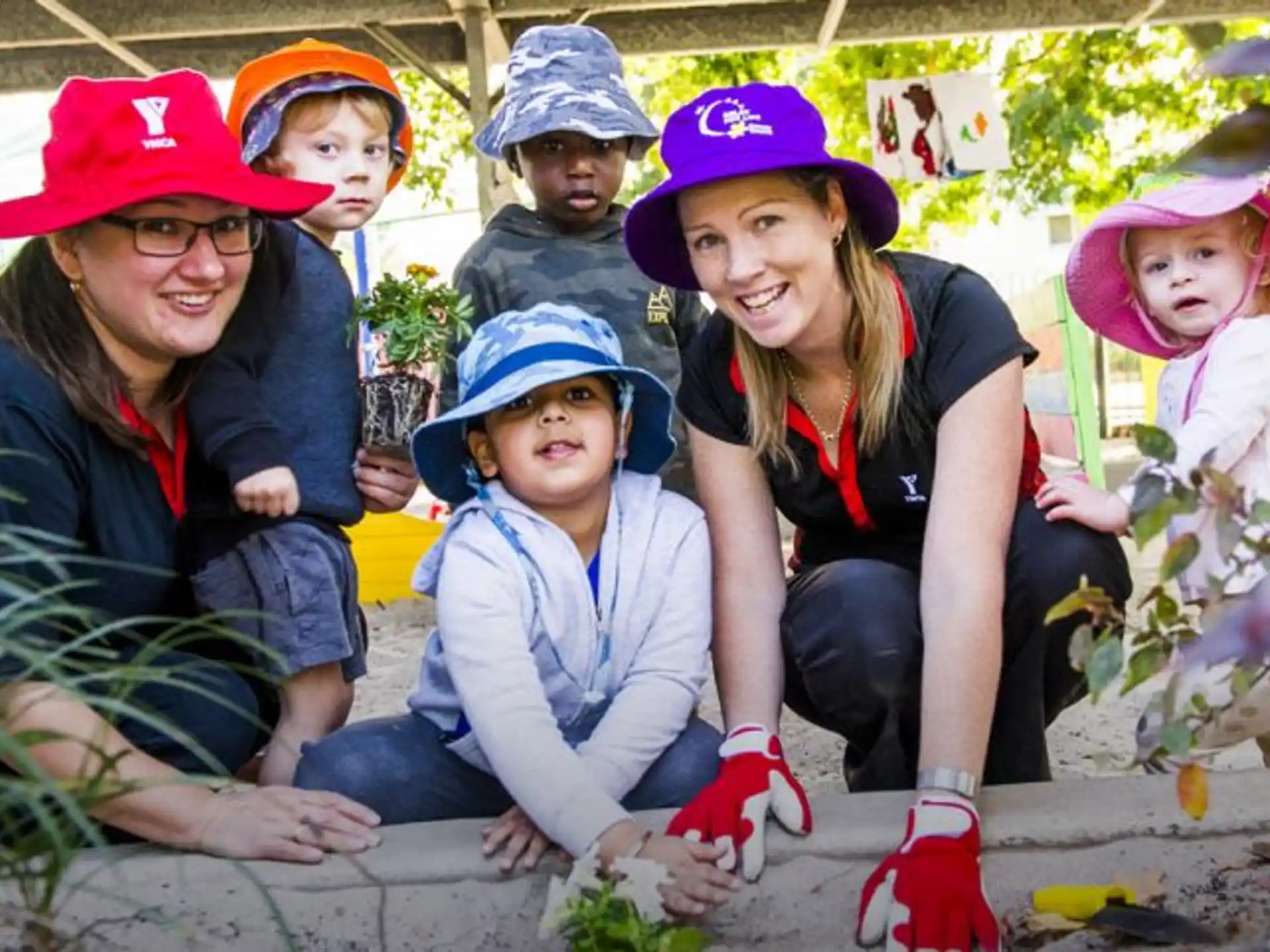 a group of people wearing hats