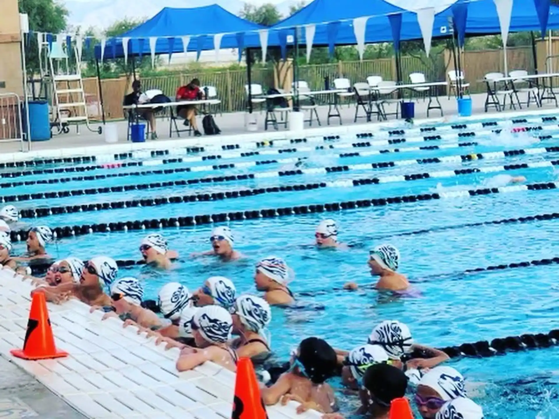 a group of people in a swimming pool