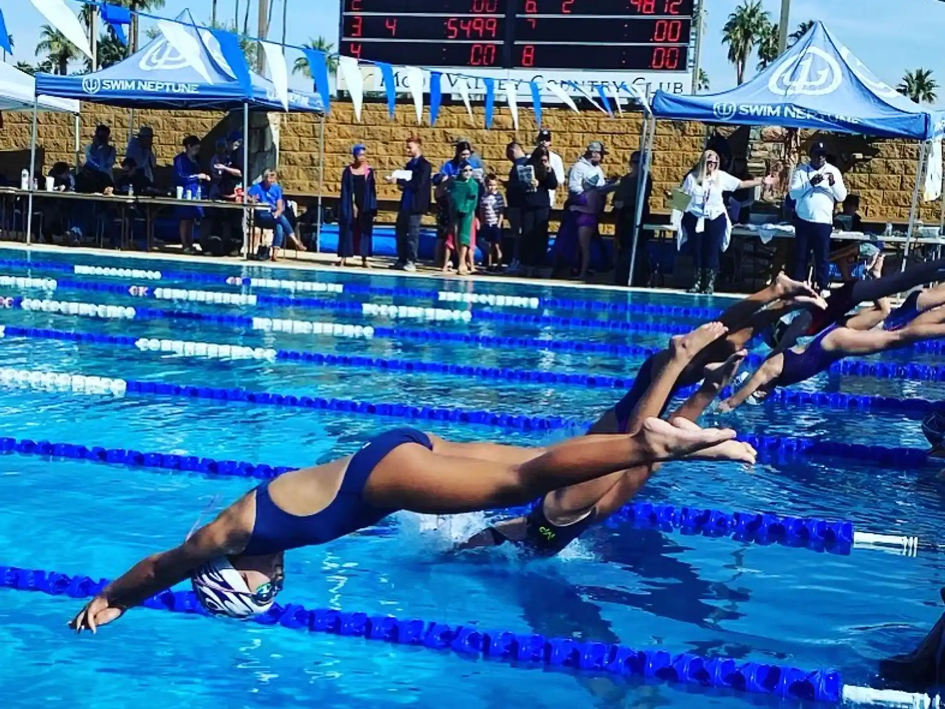a group of women in a swimming pool