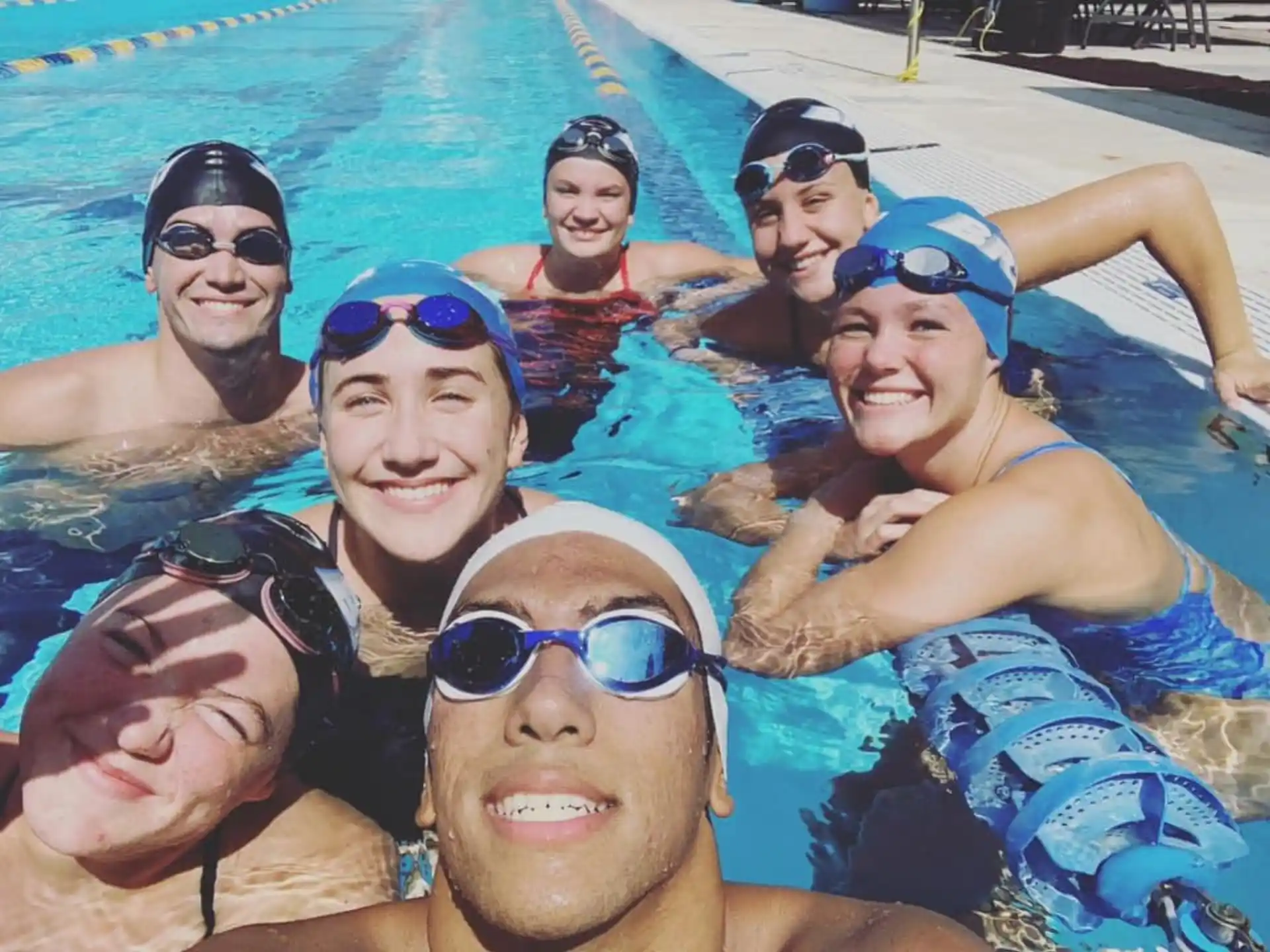 a group of people in a pool