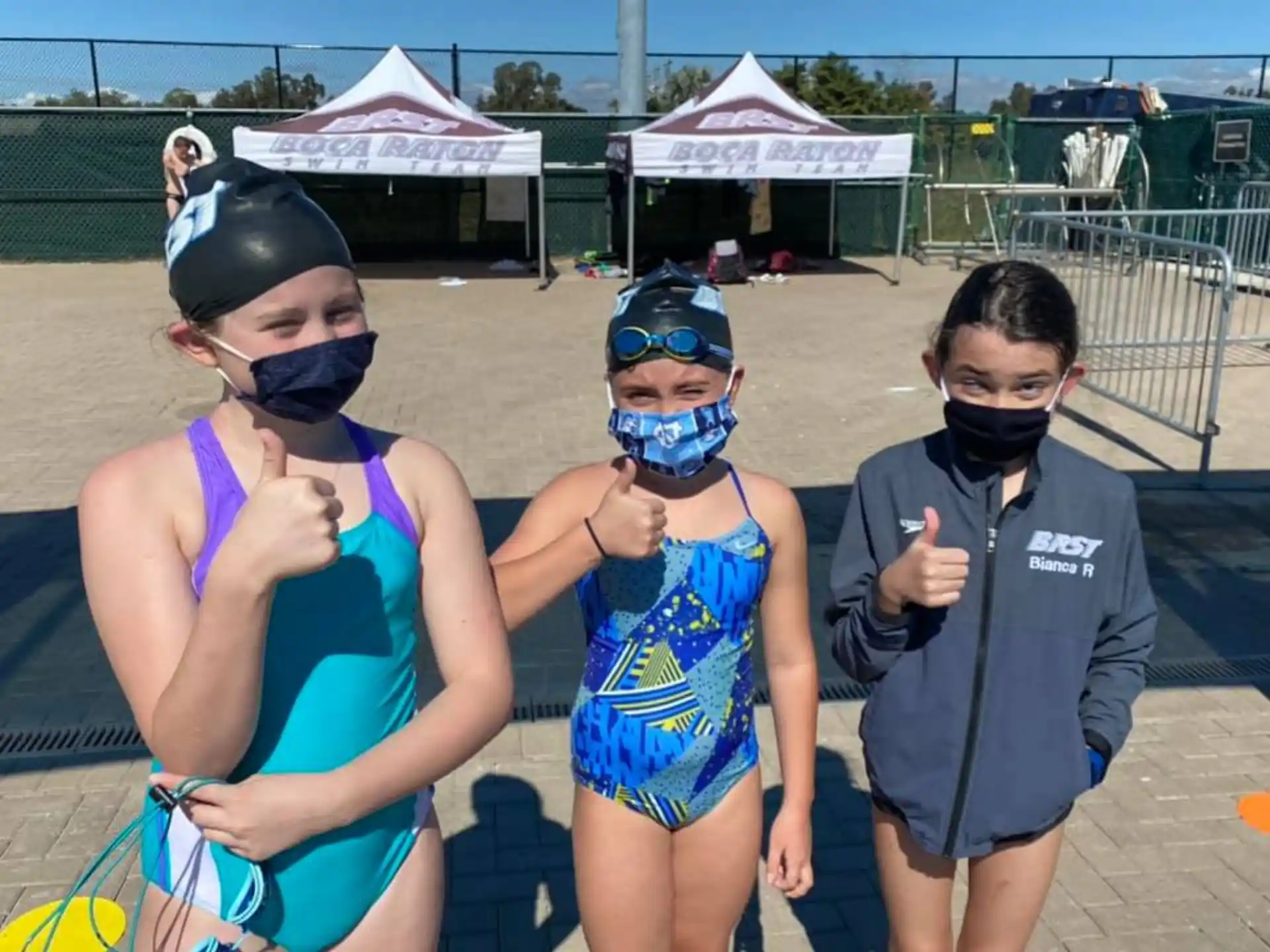 a group of people wearing masks