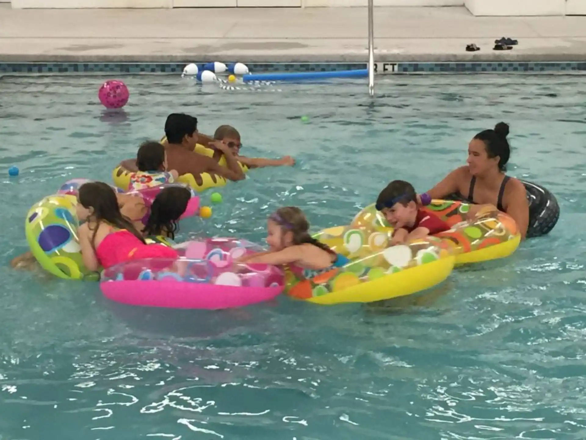 a group of people in a pool