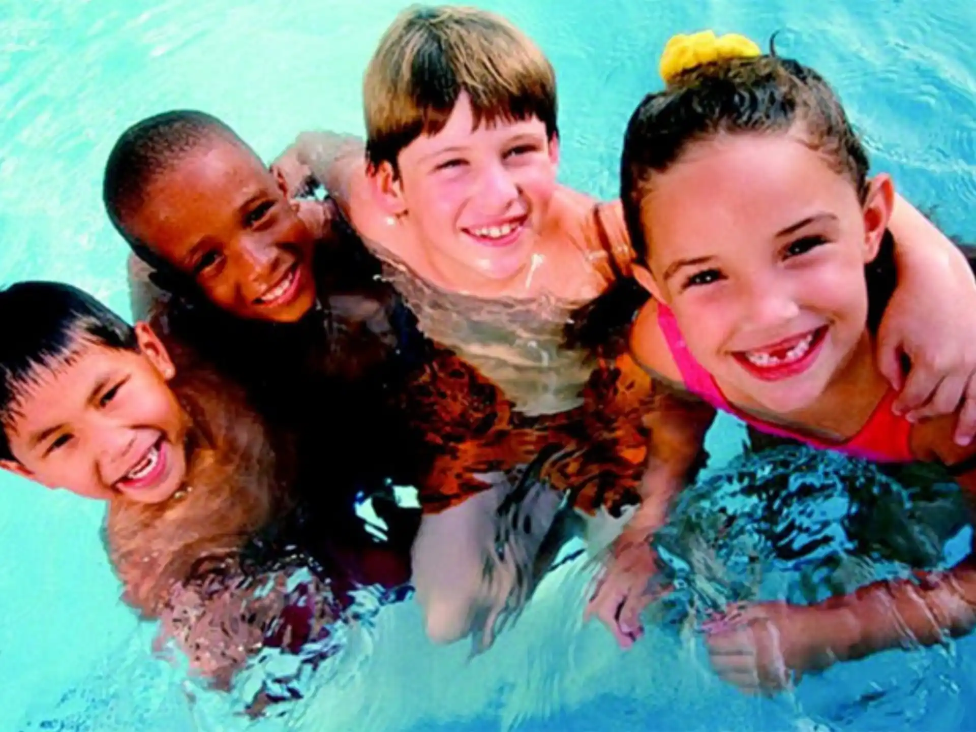 a group of people in a pool