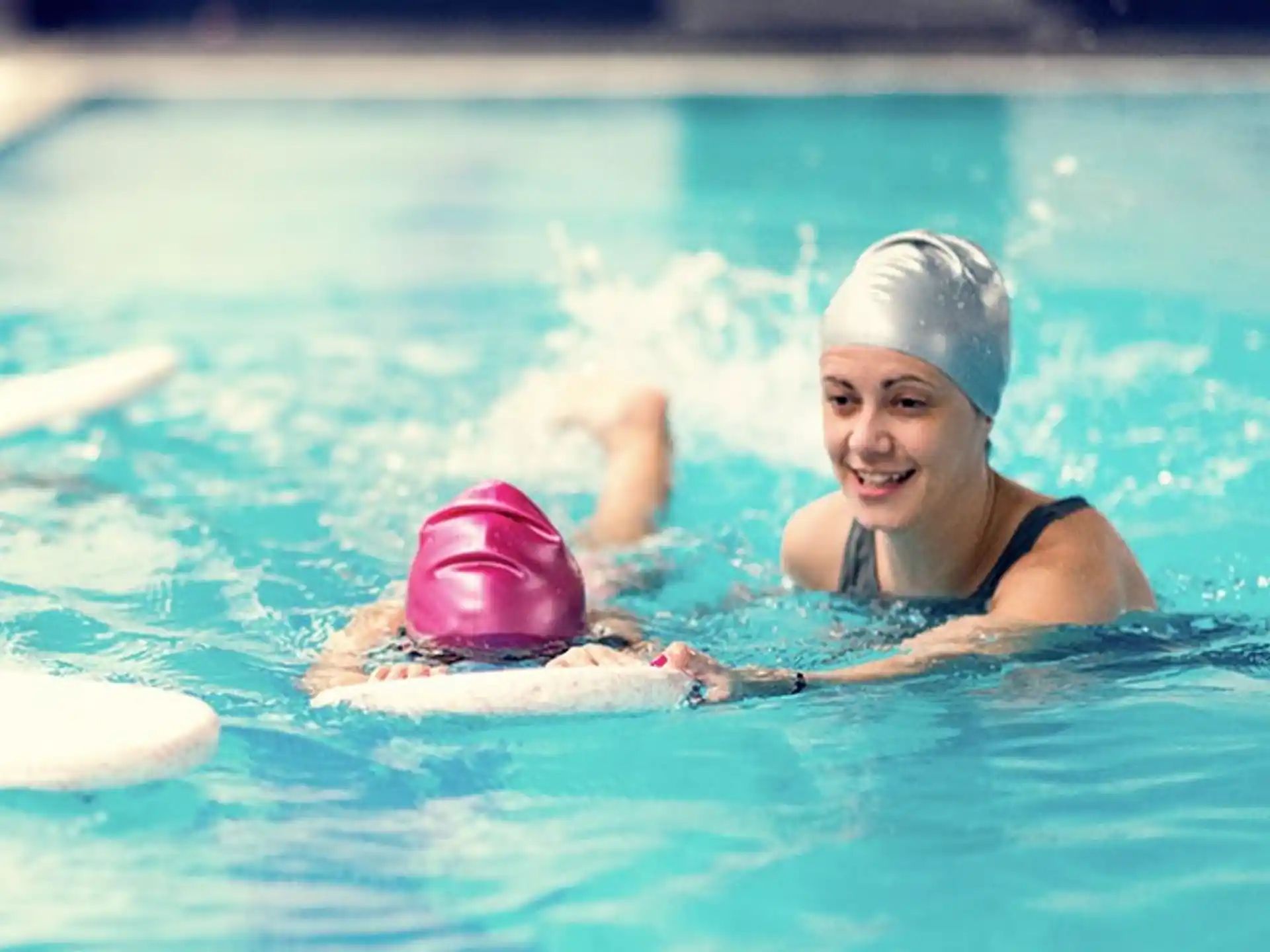 a person swimming in a pool