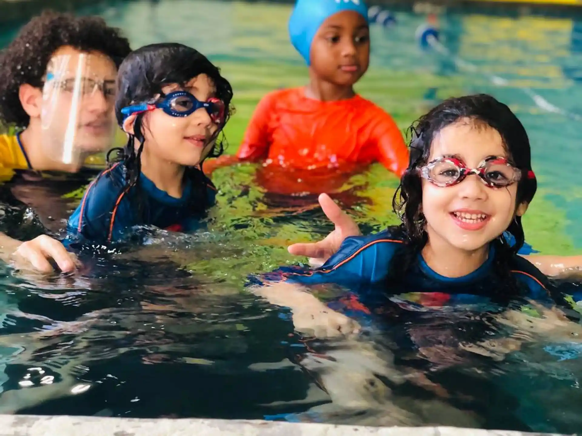 a group of people in a pool