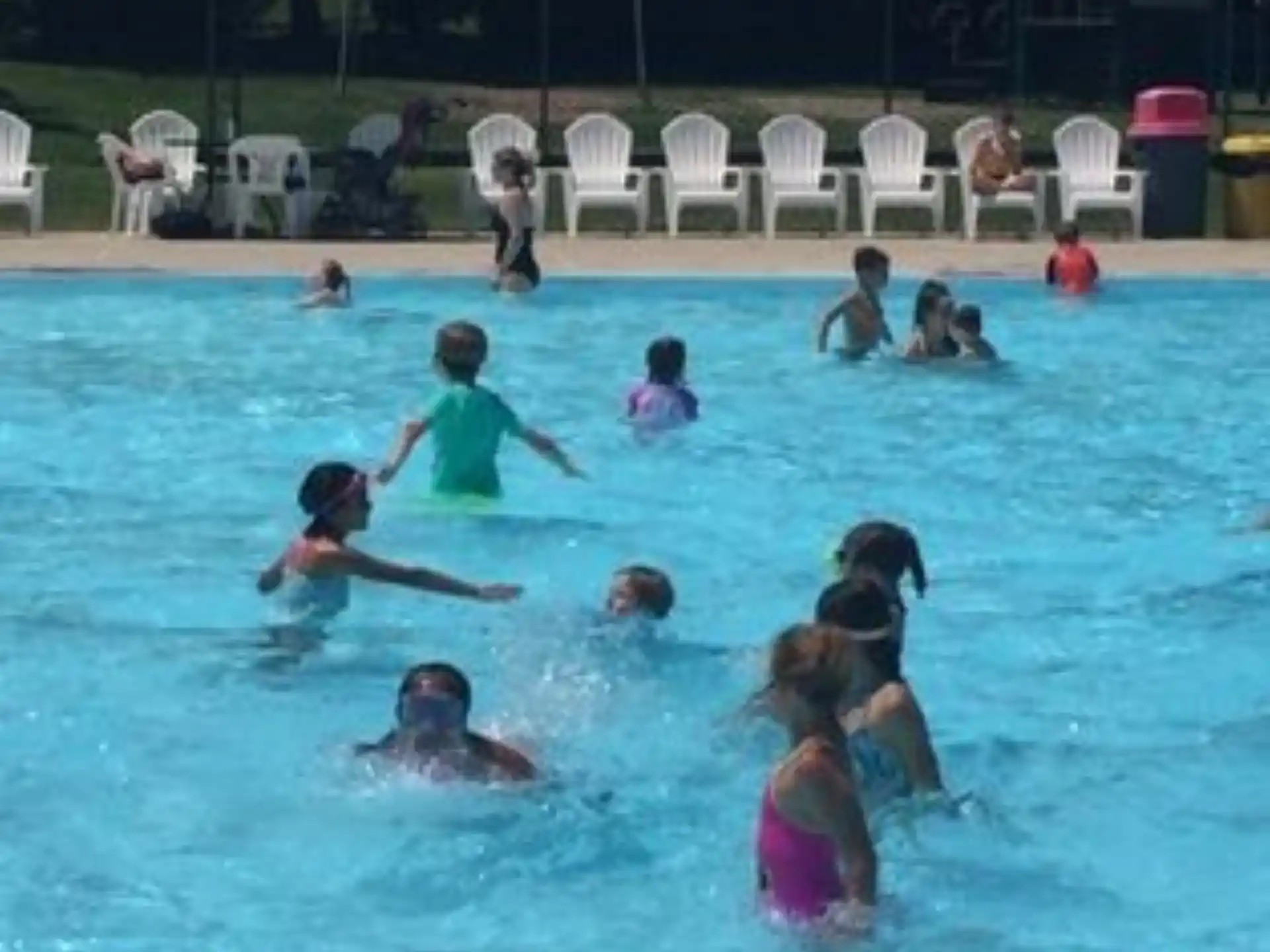 a group of people in a pool
