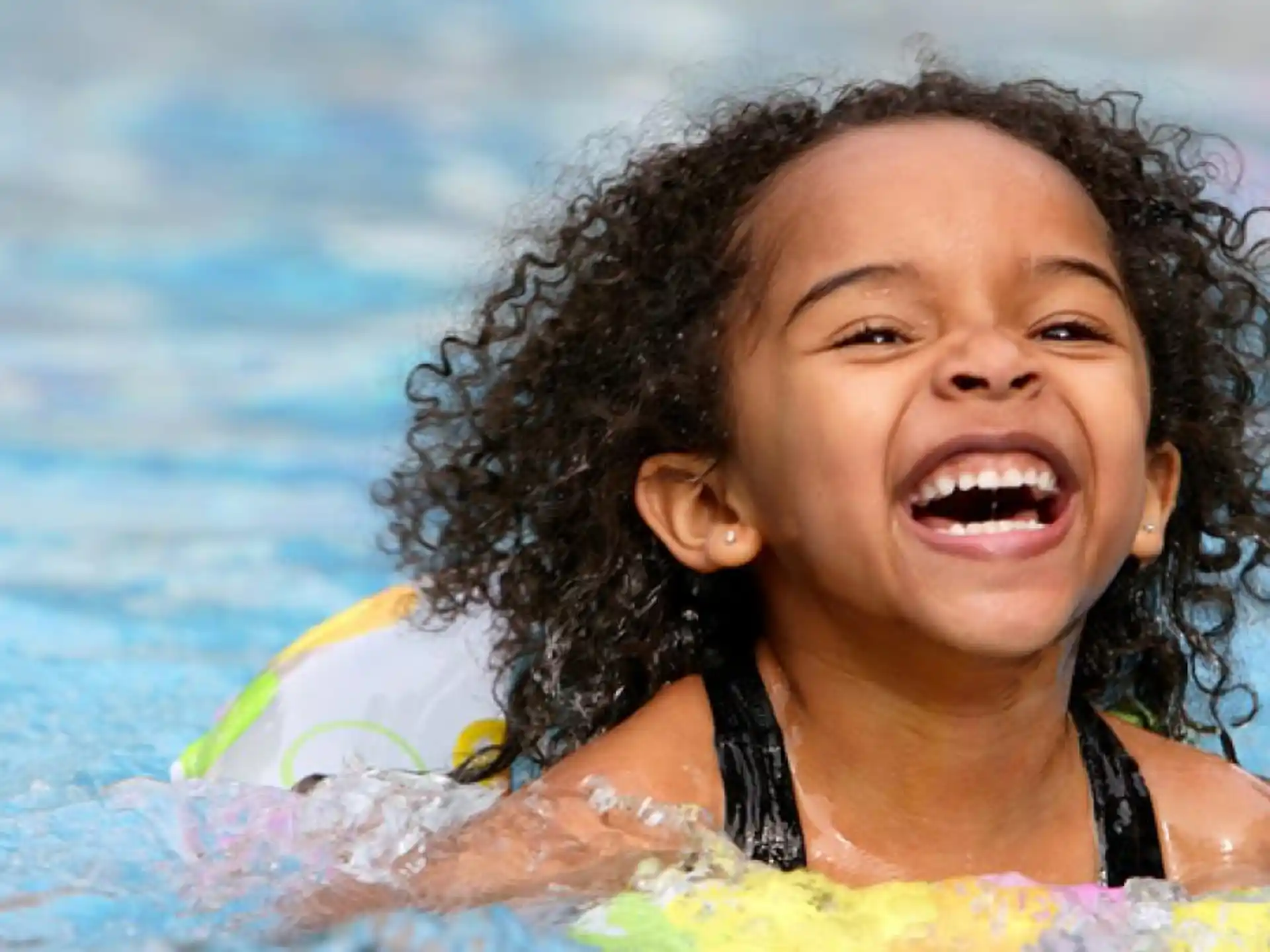 a girl in a pool