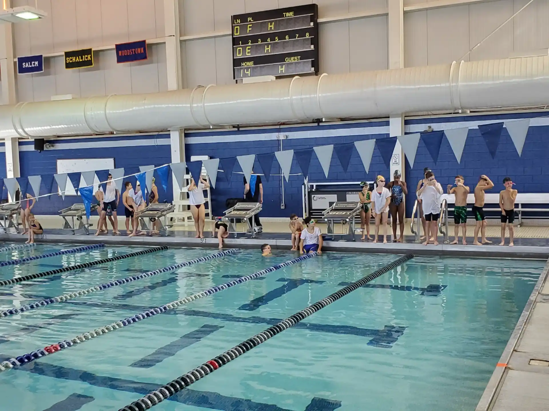 a group of people in a swimming pool