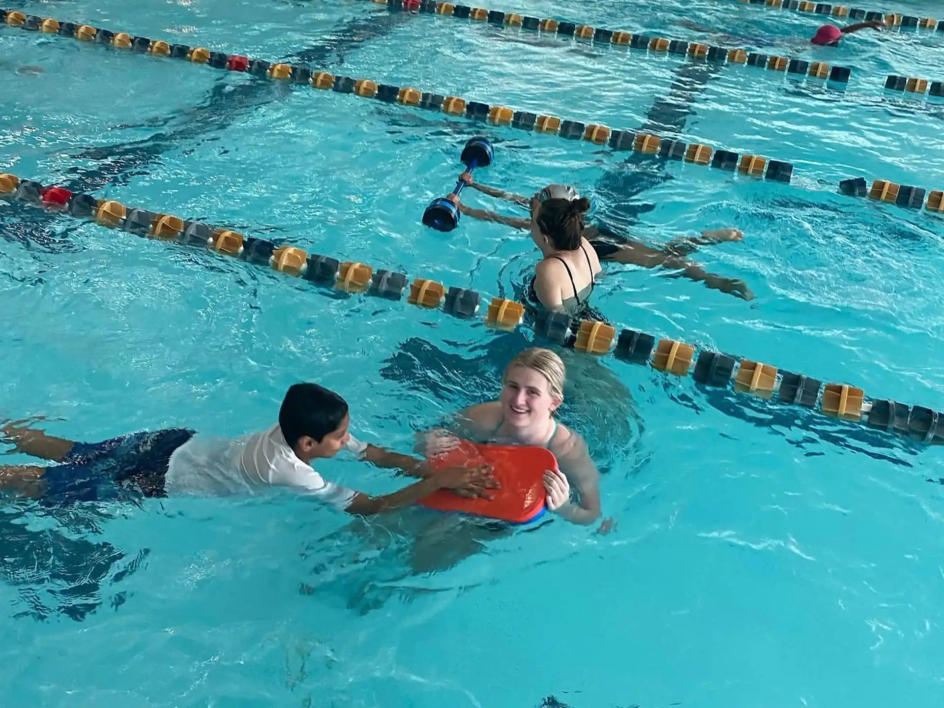 a group of people in a pool