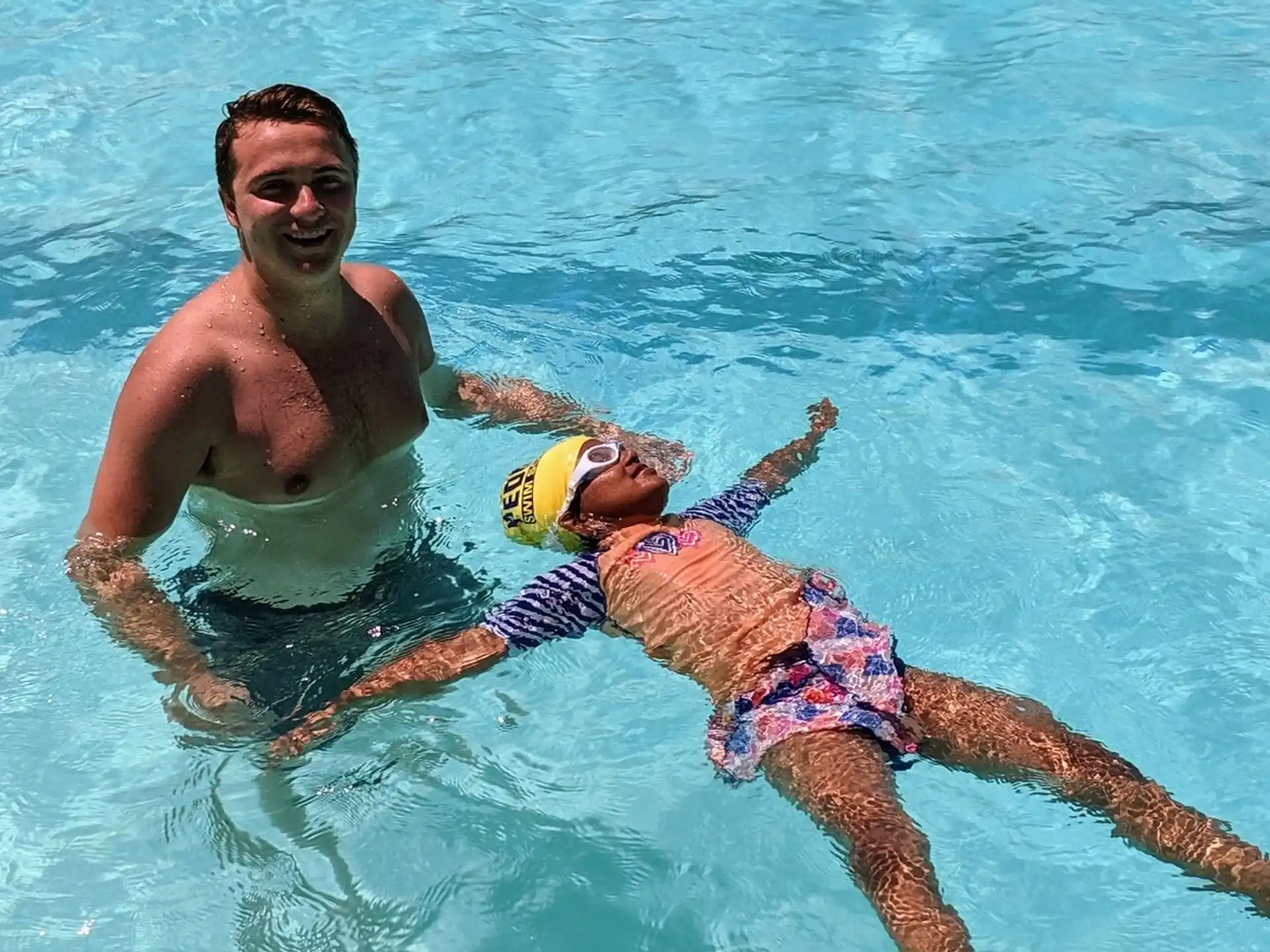 a man and a boy in the water