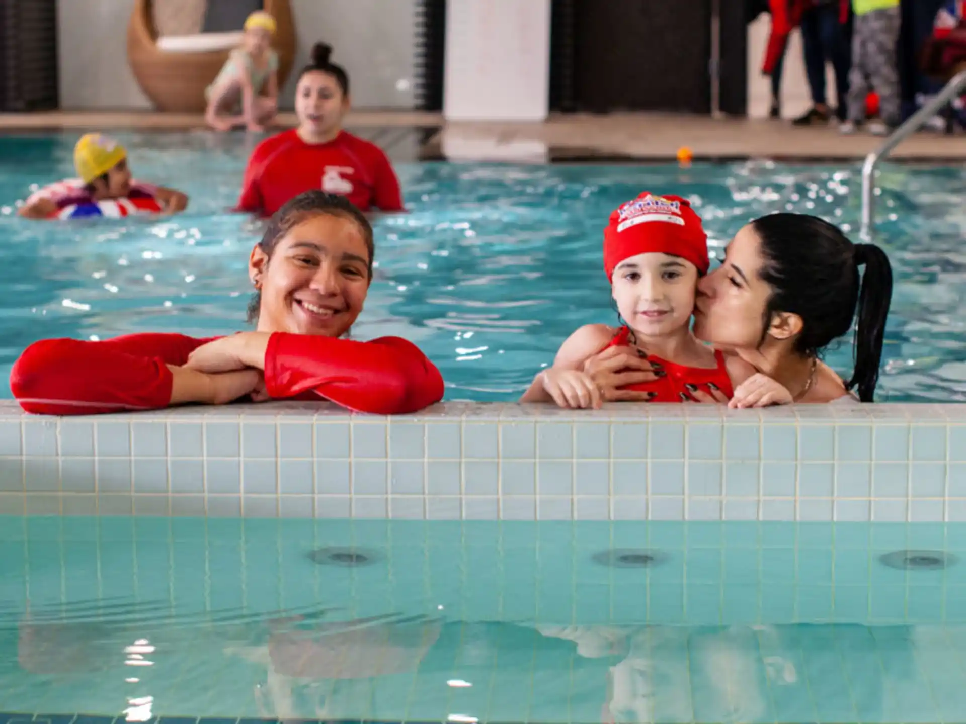 a group of people in a pool